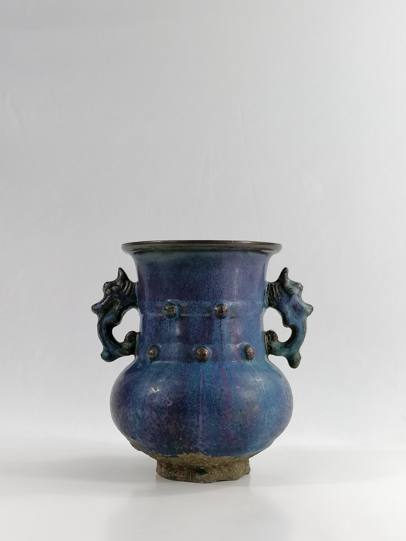 A Shiwan Ware Jun glaze vase: 19th century Late Qing dynasty Shiwanjun vase, covered thick, heavily frame red and blue glazed, decorated tripod around neck, two dragon ears. 16.9cm Height
