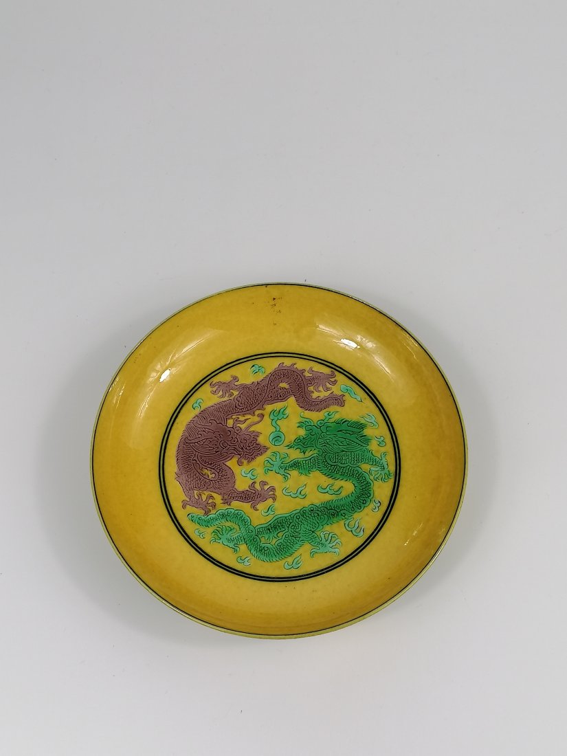 A Chinese yellow ground dragon saucer (1 of 9)