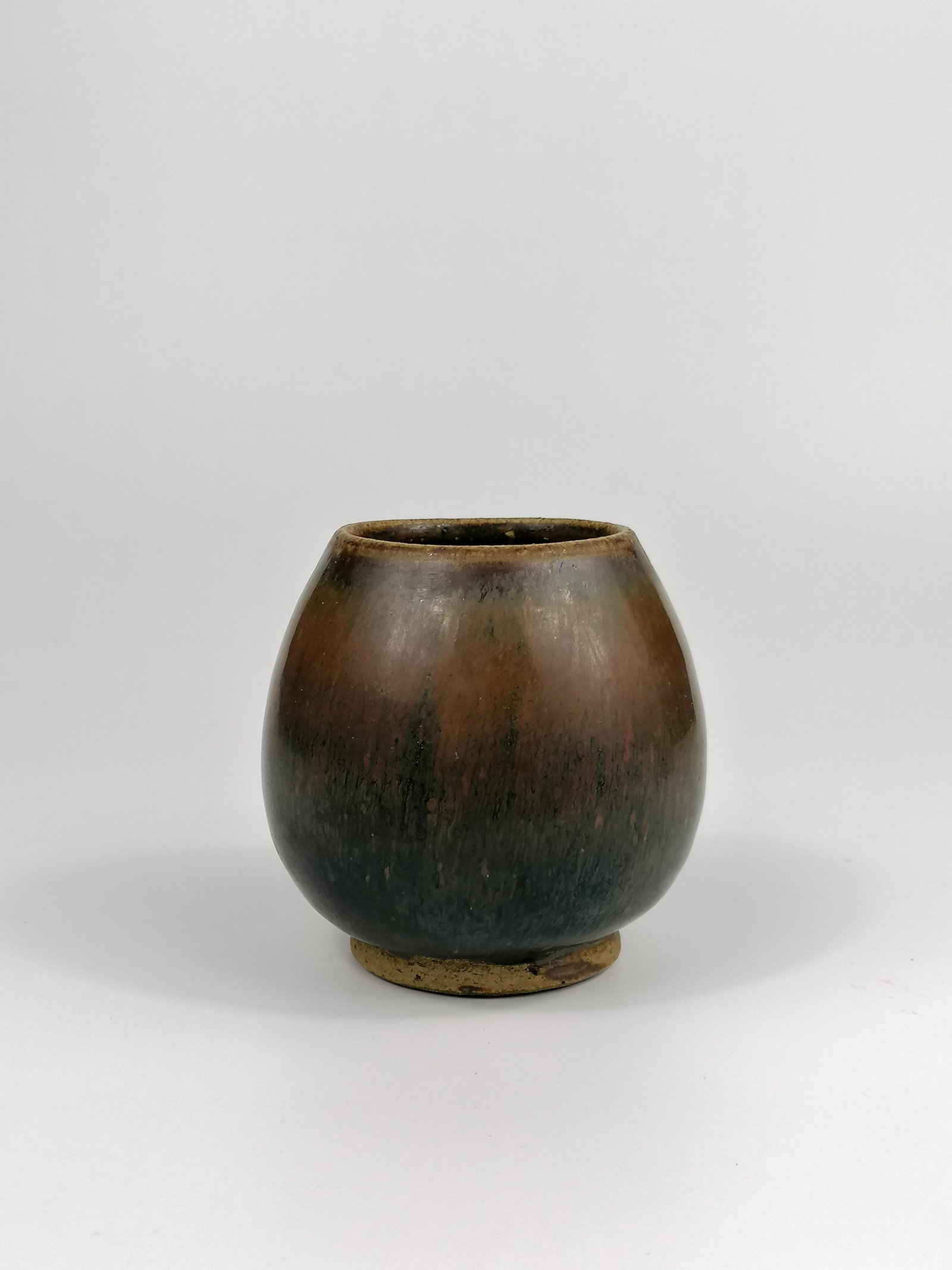 A Lotus Bud-form waterpot: Northern Song/Jin Dynasty, A northern stoneware, a persimmon-glazed waterpot. Height 8.5cmGood condition Provenance: Private collection of Sutton