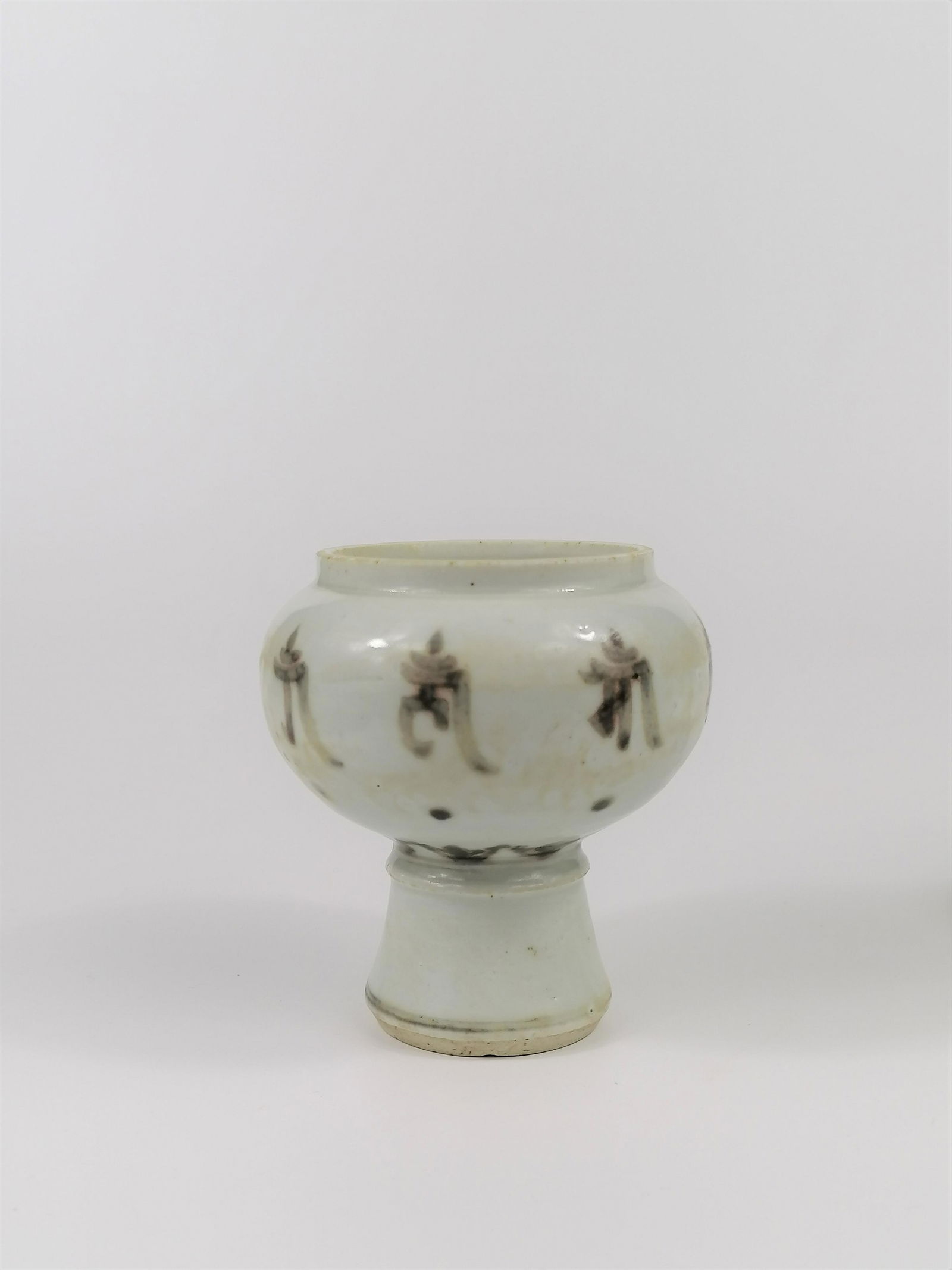 A Chinese underglaze iron red stem cup (1 of 10)