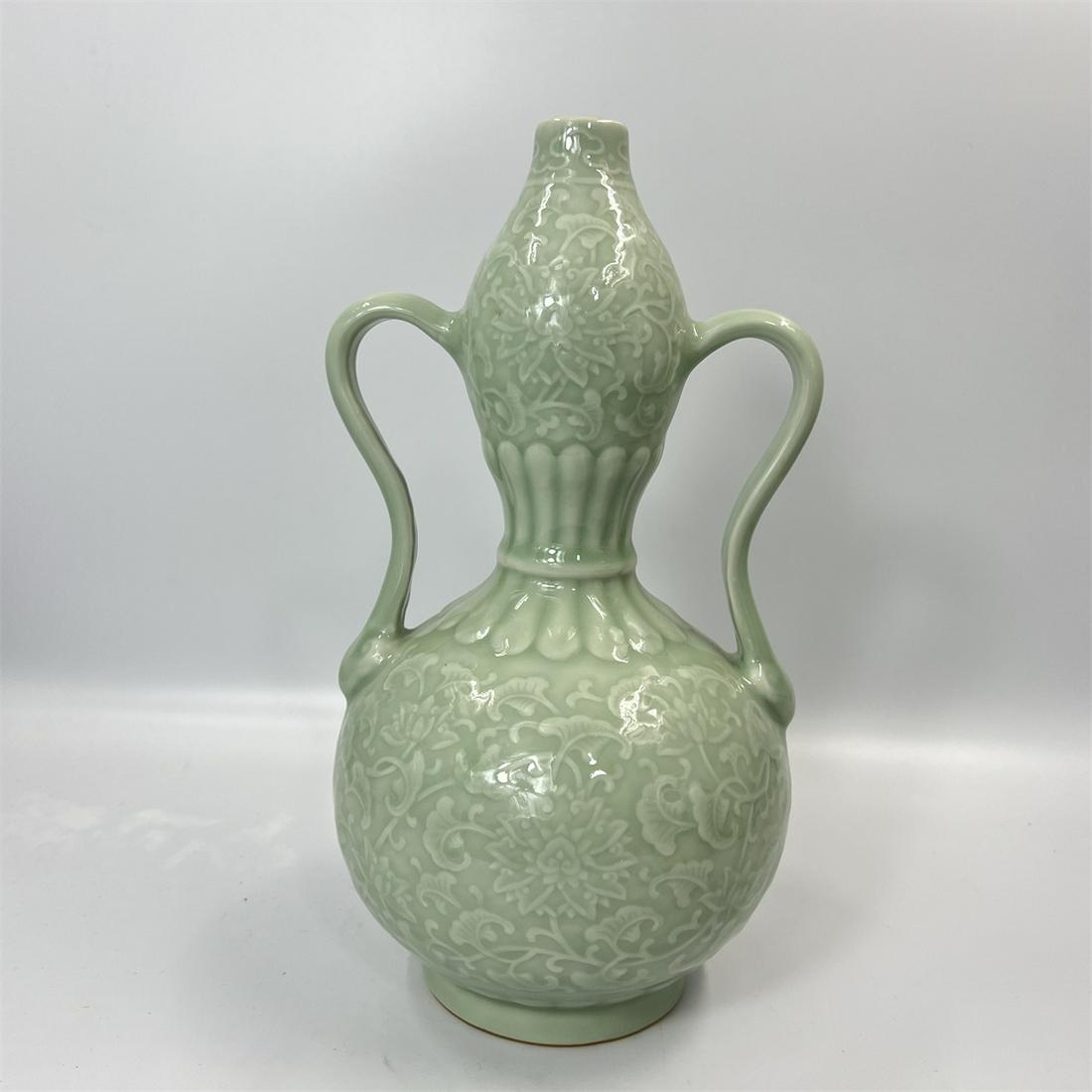 A Chinese celadon gourd vase (1 of 7)