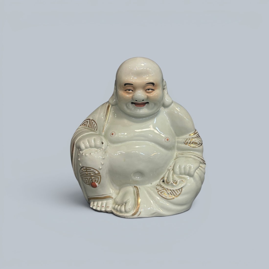 Chinese Art, A White-Glazed Gilt Figure of Maitreya, 19th-20th Century, Qing Dynasty to Republic: Chinese Art, A White-Glazed Gilt Figure of Maitreya, 19th-20th Century, Qing Dynasty to Republic Period, Height 23 cm.