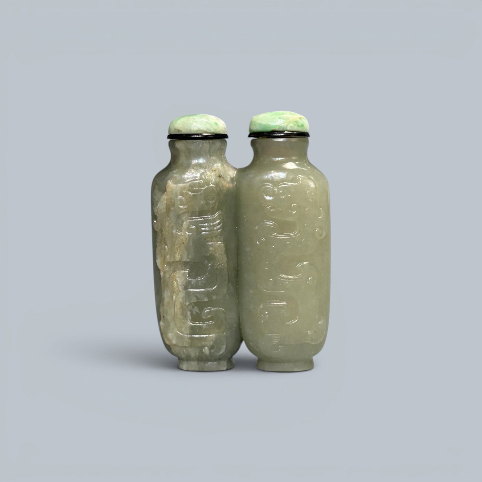 Chinese Art, A Jade Snuff Bottle Carved with Dragons, 19th Century, Qing Dynasty: Chinese Art, A Jade Snuff Bottle Carved with Dragons, 19th Century, Qing Dynasty, Height 6.8 cm.