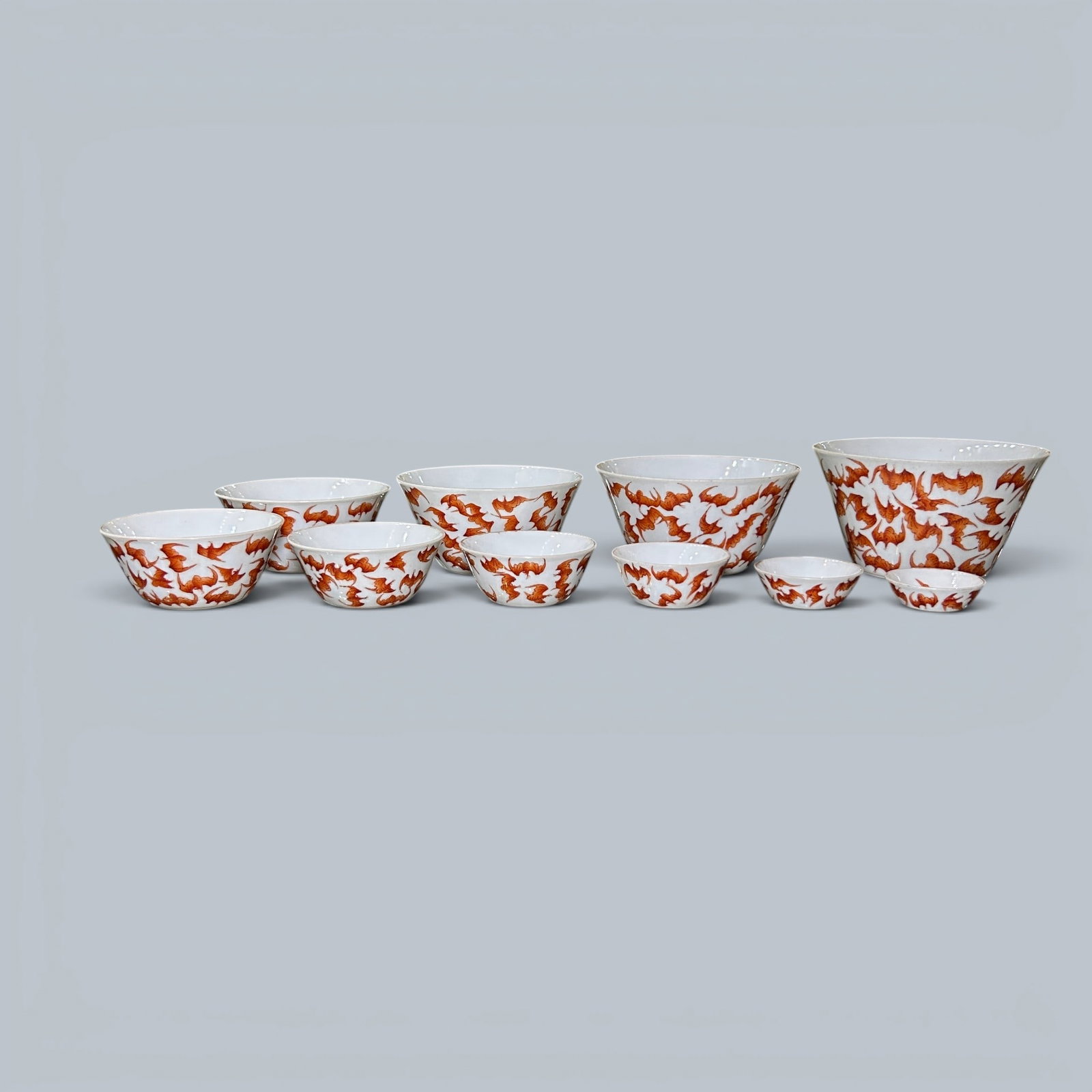 Chinese Art, A Group of Ten Iron-Red Decorated Cups with Bat Motifs, Nesting, 18th-19th Century, (1 of 16)
