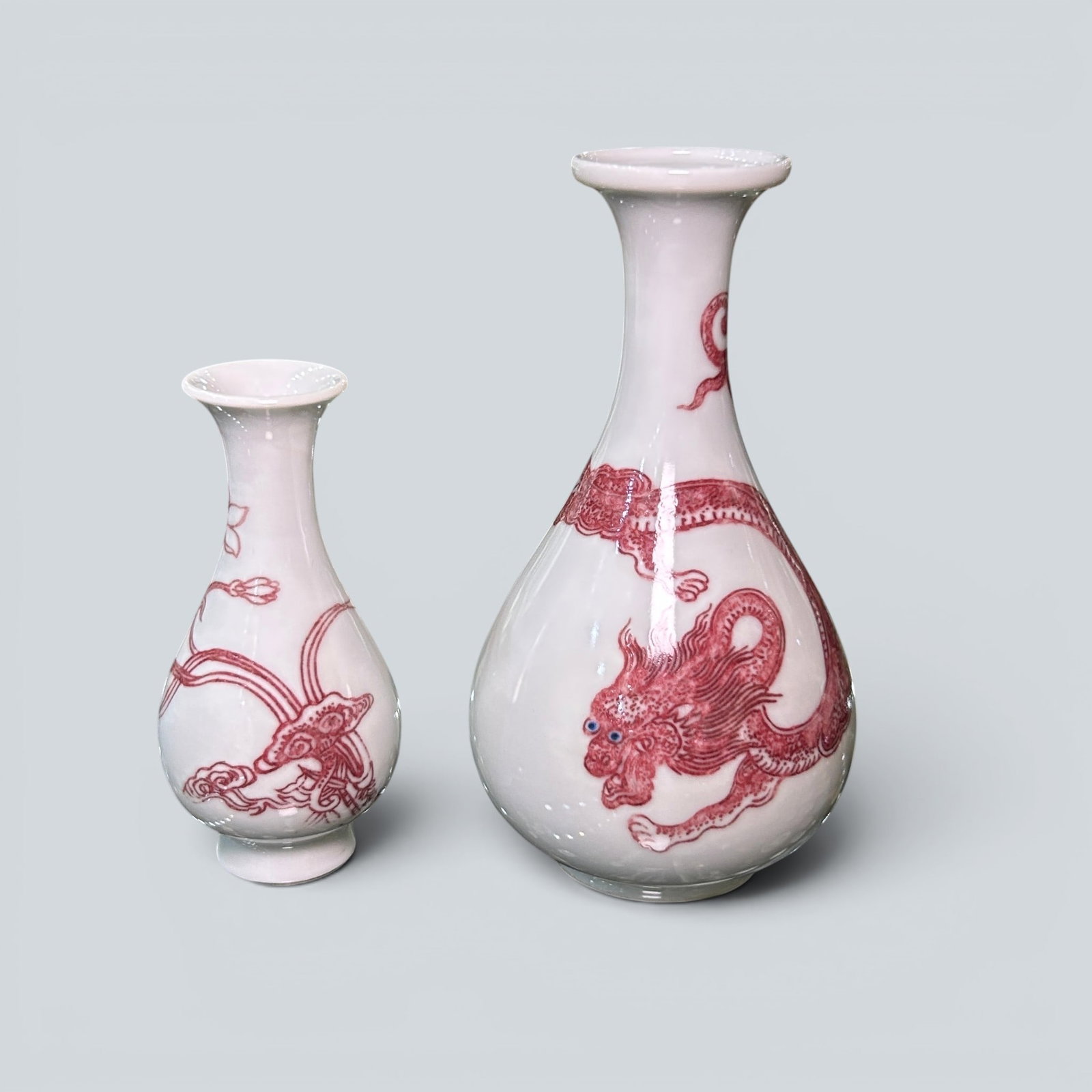 Chinese Art, A Group of Underglaze Blue Dragon and Lingzhi-Decorated Vases, 18th-19th Century,: Chinese Art, A Group of Underglaze Blue Dragon and Lingzhi-Decorated Vases, 18th-19th Century, Qing Dynasty, Heights 8.9 cm and 12.8 cm.