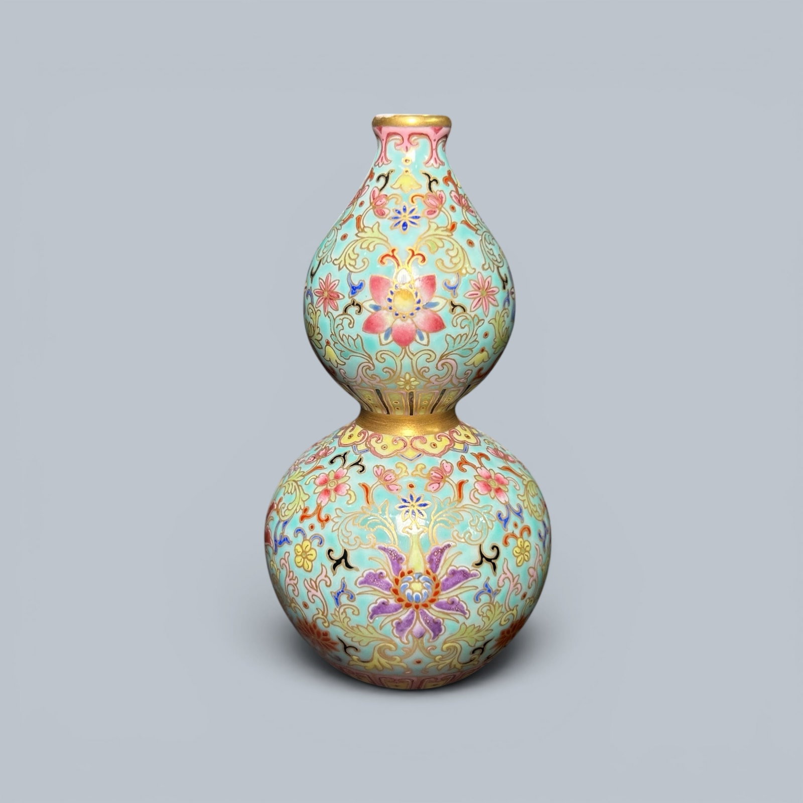 Chinese Art, A Famille Rose Double-Gourd Vase Decorated with Floral Motifs, 18th Century, Qing: Chinese Art, A Famille Rose Double-Gourd Vase Decorated with Floral Motifs, 18th Century, Qing Dynasty, Height 12 cm.