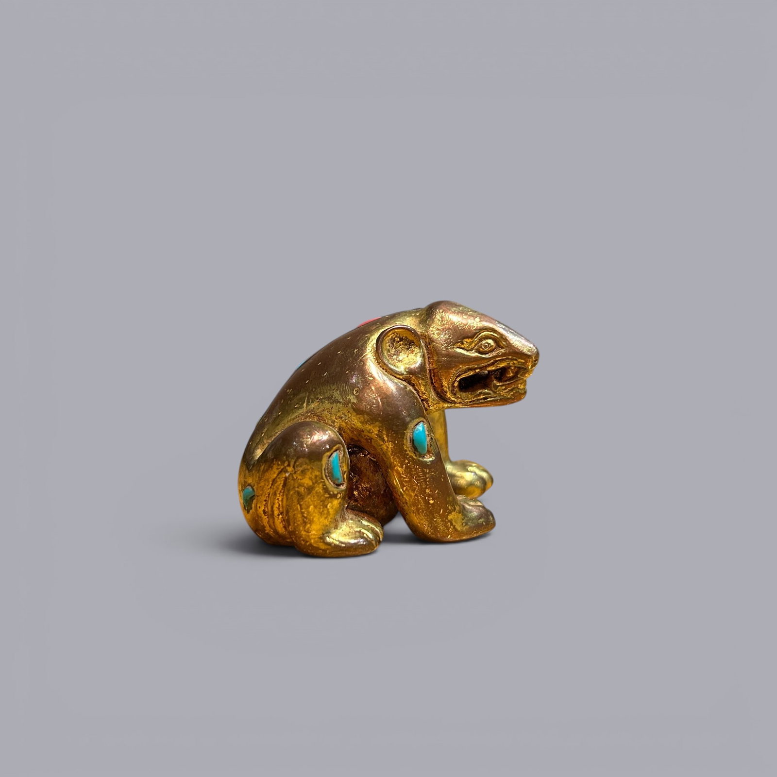 Chinese Art, A Gilt-Bronze Figure of a Bear, 3rd Century BC-2nd Century AD, Han Dynasty: Chinese Art, A Gilt-Bronze Figure of a Bear, 3rd Century BC?C2nd Century AD, Han Dynasty, Height 3.9 cm, Length 5 cm, Width 4 cm Condition.