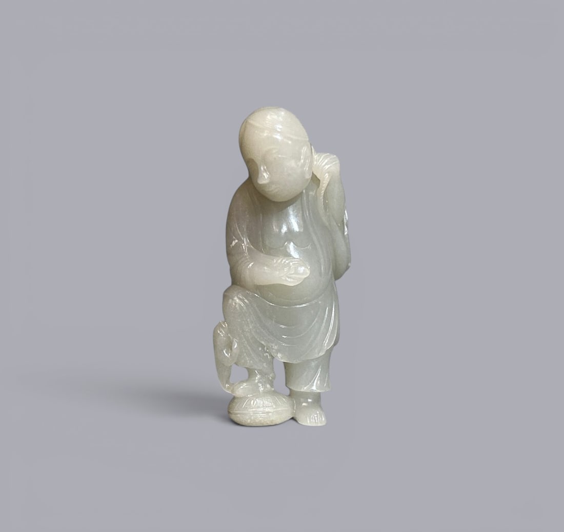 Chinese Art, A White Jade Figure of a Daoist Immortal, 17th-18th Century, Qing Dynasty: Chinese Art, A White Jade Figure of a Daoist Immortal, 17th-18th Century, Qing Dynasty, Height 8.7 cm, Width 4.2 cm.