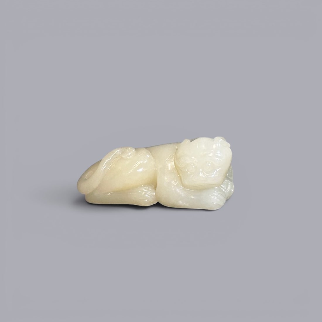 Chinese Art, A White Jade Mythical Beast, 17th-18th Century, Qing Dynasty: Chinese Art, A White Jade Mythical Beast, 17th-18th Century, Qing Dynasty, Length 6.9 cm, Width 3.4 cm.