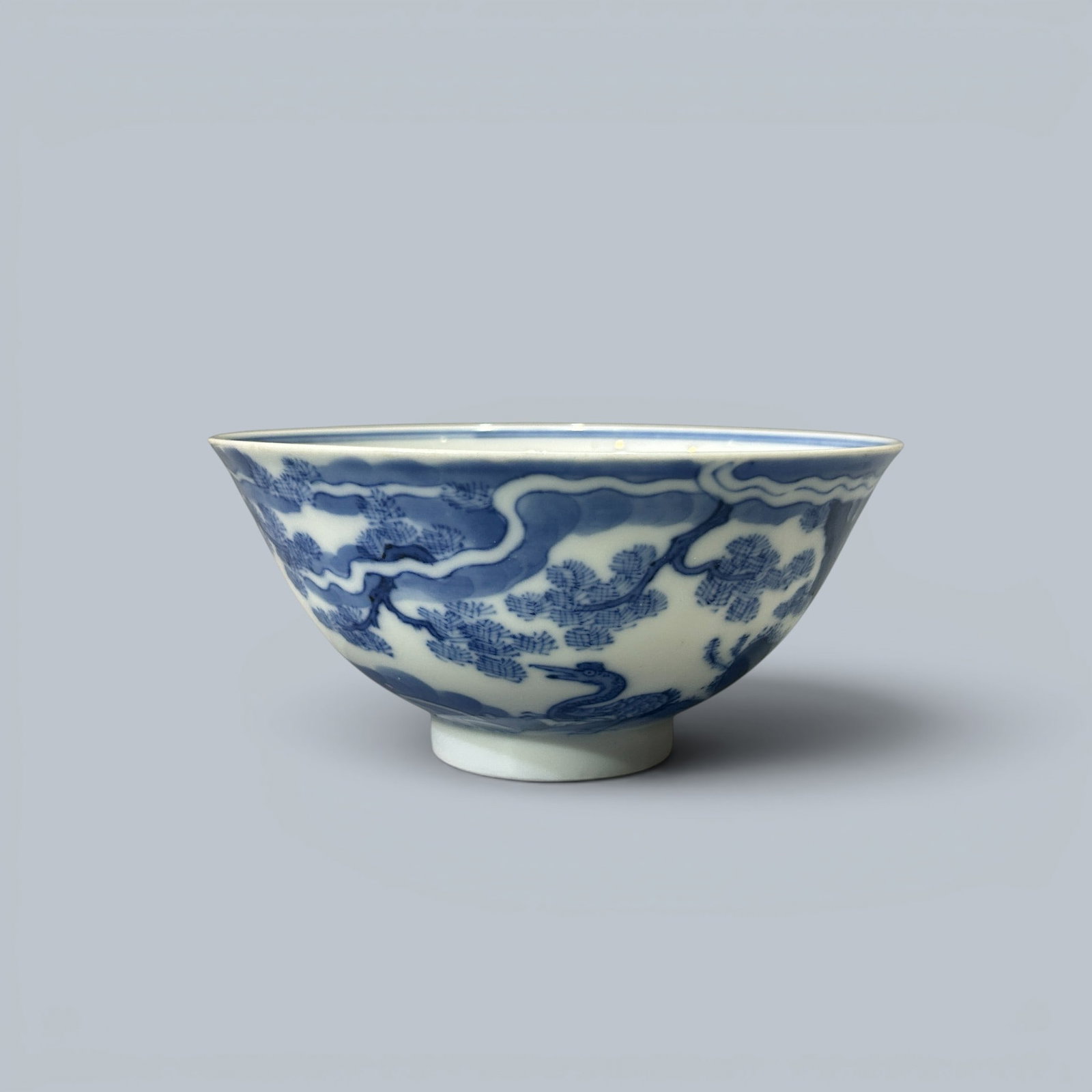 Chinese Art, A Blue and White Bowl Decorated with Cranes, 19th Century, Qing Dynasty: Chinese Art, A Blue and White Bowl Decorated with Cranes, 19th Century, Qing Dynasty, Height 5.5 cm, Diameter 11.6 cm.