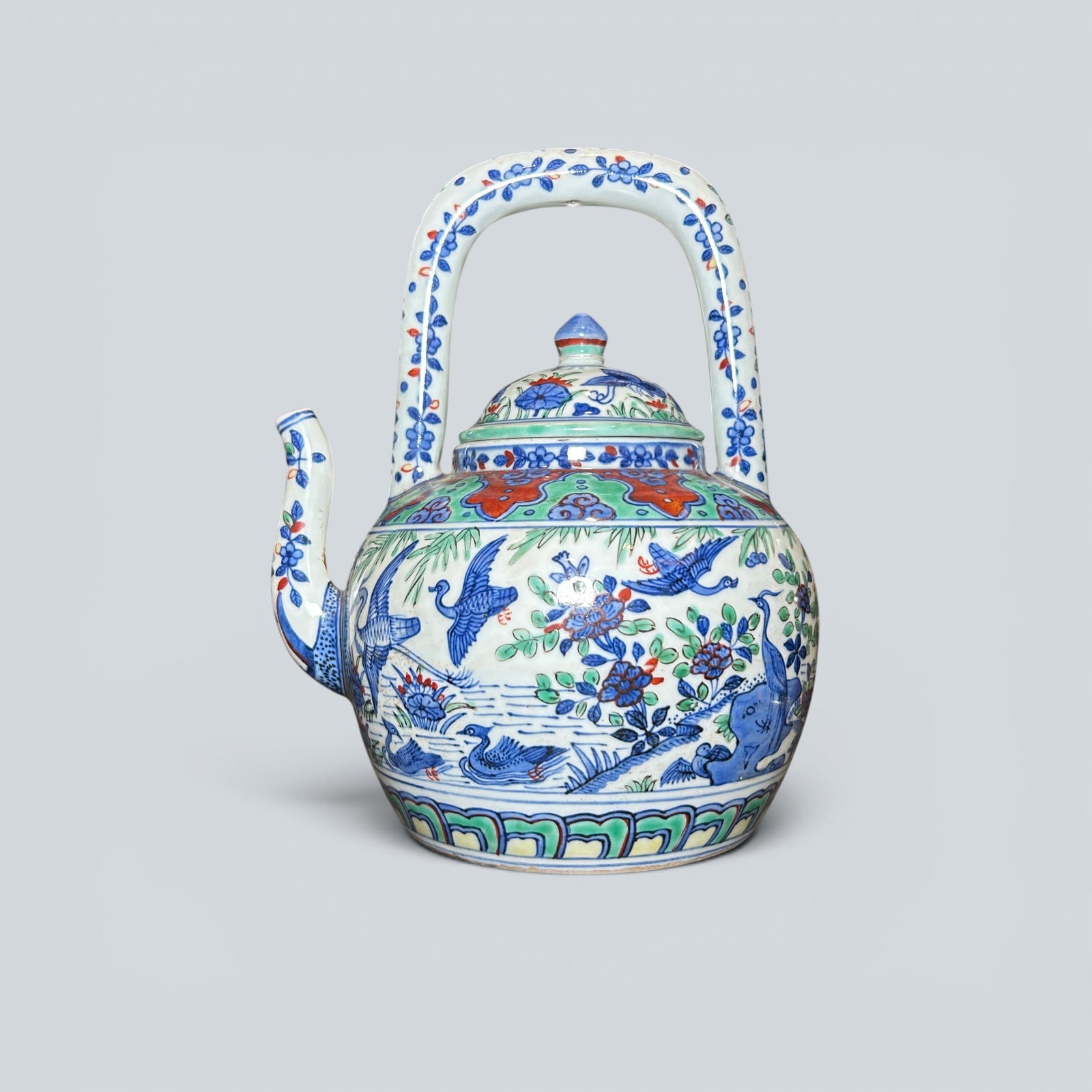 Chinese Art, A Wucai Ewer Decorated with Figures and Geese, 16th Century, Ming Dynasty: Chinese Art, A Wucai Ewer Decorated with Figures and Geese, 16th Century, Ming Dynasty, Height 19.5 cm, Width 22.5 cm.