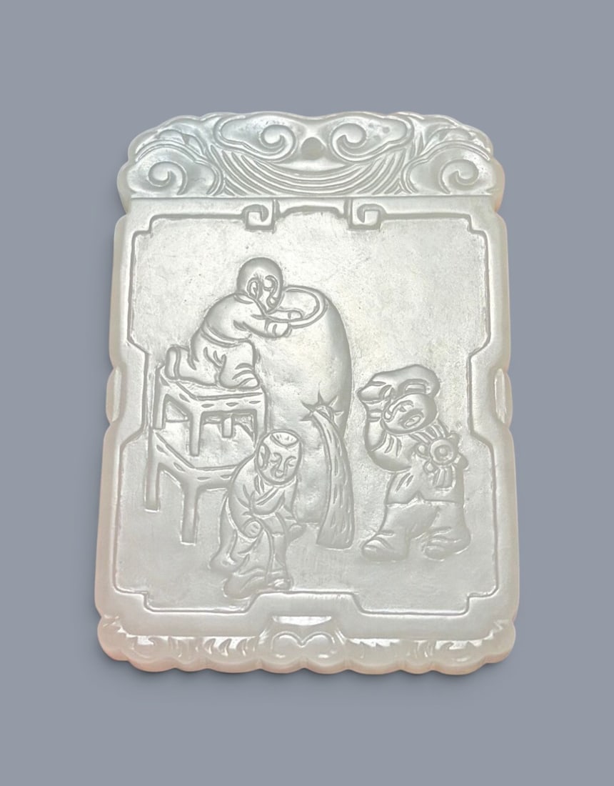 Chinese Art, A Jade Plaque Carved with a Boy, 16th-18th Century, Qing Dynasty: Chinese Art, A Jade Plaque Carved with a Boy, 16th-18th Century, Qing Dynasty, Height 5.9 cm, Width 4 cm, Thickness 0.58 cm.