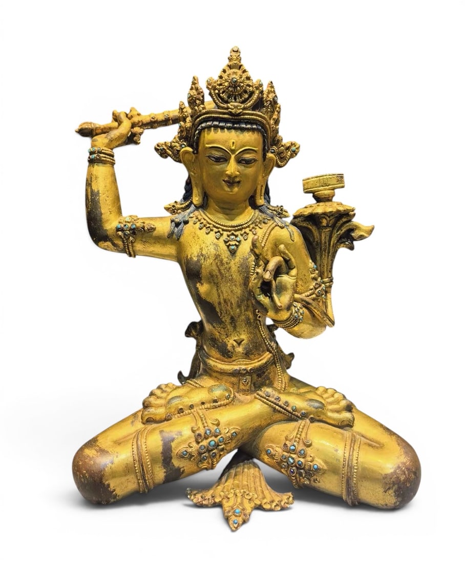 Himalayan Art, Tibet, A Gilt-Bronze Figure of Manjushri, 15th-17th Century: Himalayan Art, Tibet, A Gilt-Bronze Figure of Manjushri, 15th-17th Century, Height 28 cm, Width 20 cm.