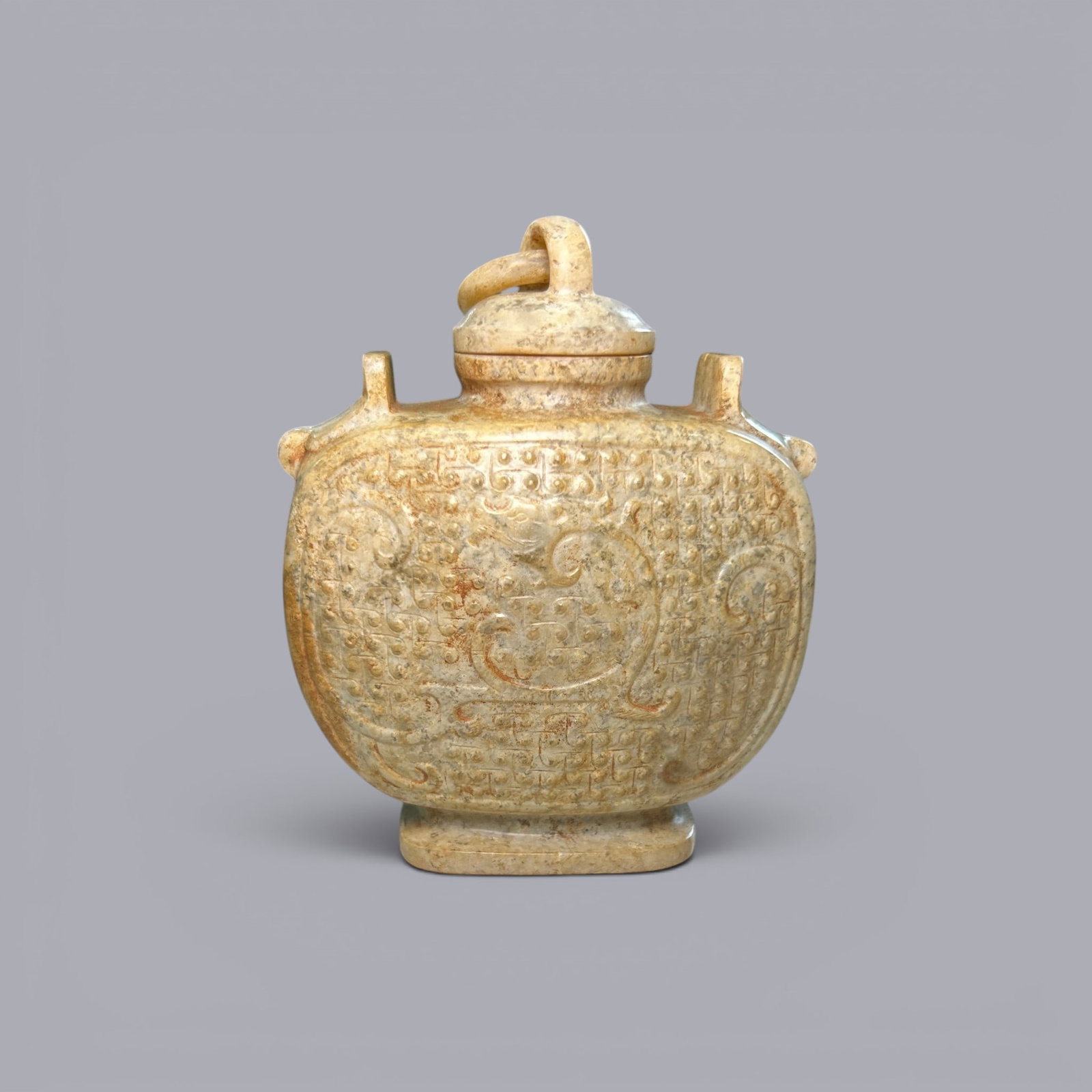 Chinese Art, A Jade Vessel Decorated with Dragons, 3rd Century BC-3rd Century AD, Han Dynasty: Chinese Art, A Jade Vessel Decorated with Dragons, 3rd Century BC-3rd Century AD, Han Dynasty, Height 9.1 cm, Width 7.2 cm.