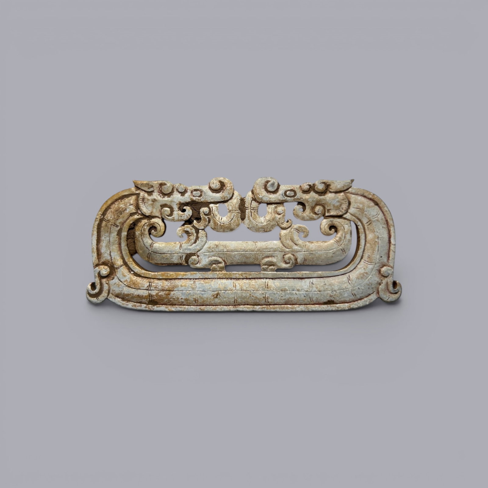 Chinese Art, A Jade Pendant Decorated with Dragons, 3rd Century BC-3rd Century AD, Han Dynasty: Chinese Art, A Jade Pendant Decorated with Dragons, 3rd Century BC-3rd Century AD, Han Dynasty, Length 7.4 cm, Width 3.1 cm.