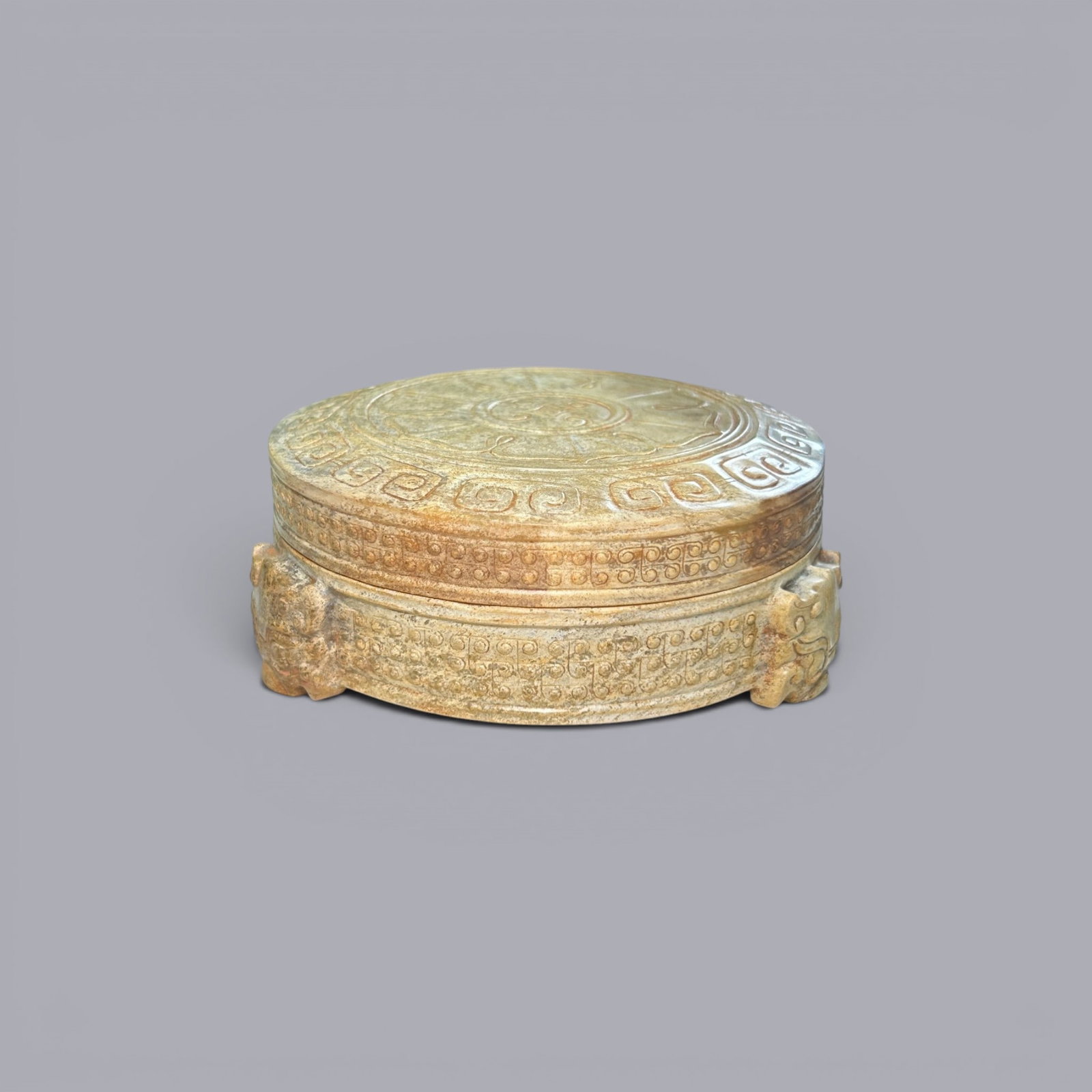 Chinese Art, A Jade Covered Box Decorated with Dragons, 3rd Century BC-3rd Century AD, Han Dynasty: Chinese Art, A Jade Covered Box Decorated with Dragons, 3rd Century BC-3rd Century AD, Han Dynasty, Height 4.1 cm, Width 10.1 cm.