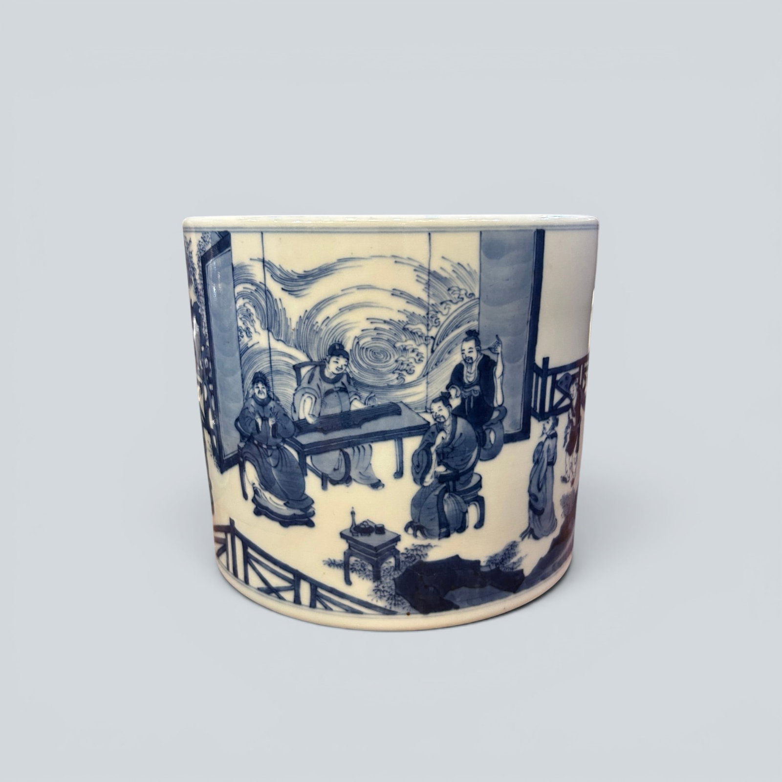 Chinese Art, A Blue and White Brush Pot Decorated with Figures, 17th Century, Qing Dynasty: Chinese Art, A Blue and White Brush Pot Decorated with Figures, 17th Century, Qing Dynasty, Height 20 cm, Diameter 22 cm.