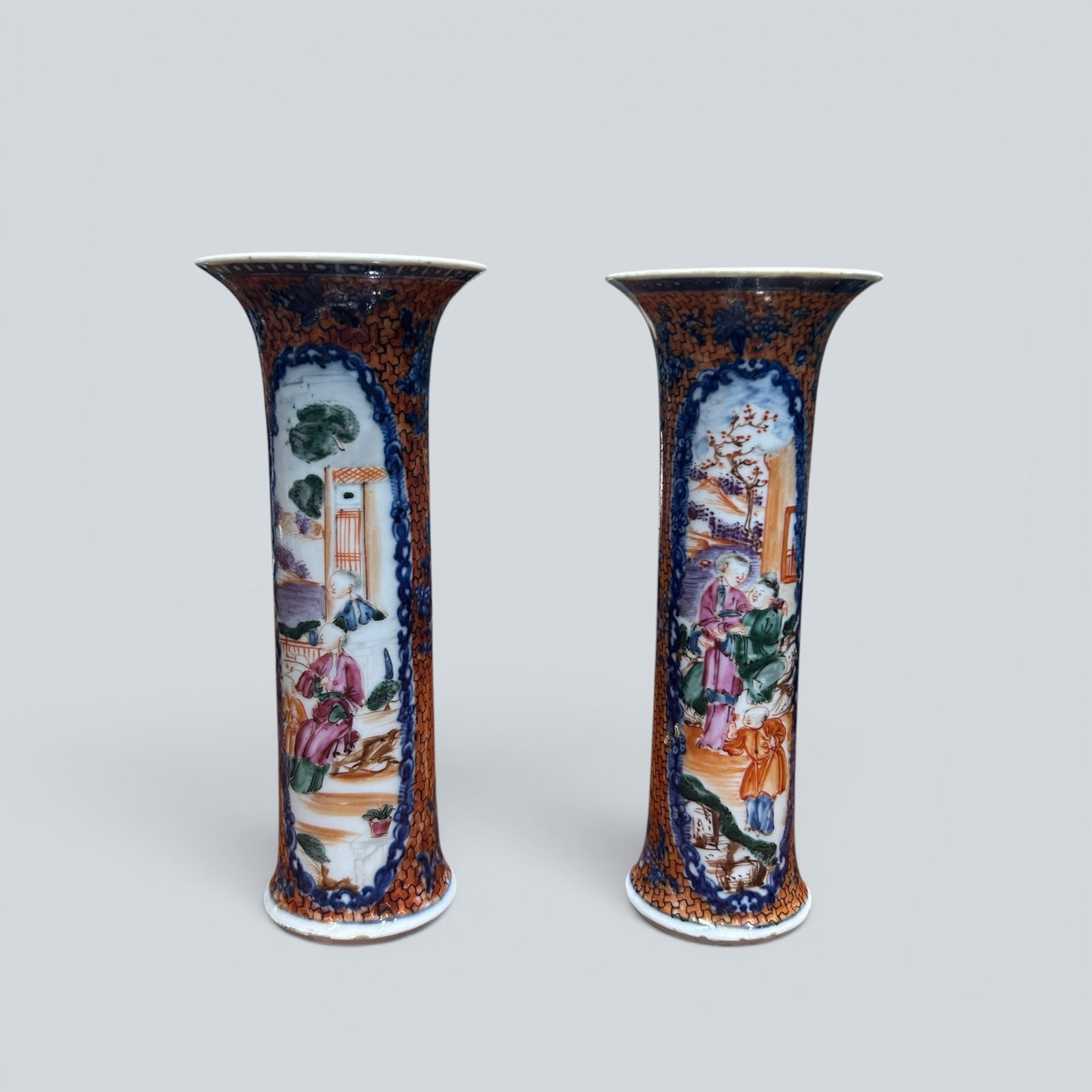 Chinese Art, A Pair of Canton Enamel Vases Decorated with Figures, 18th Century, Qing Dynasty: Chinese Art, A Pair of Canton Enamel Vases Decorated with Figures, 18th Century, Qing Dynasty, Heights 21 cm and 20.5 cm.
