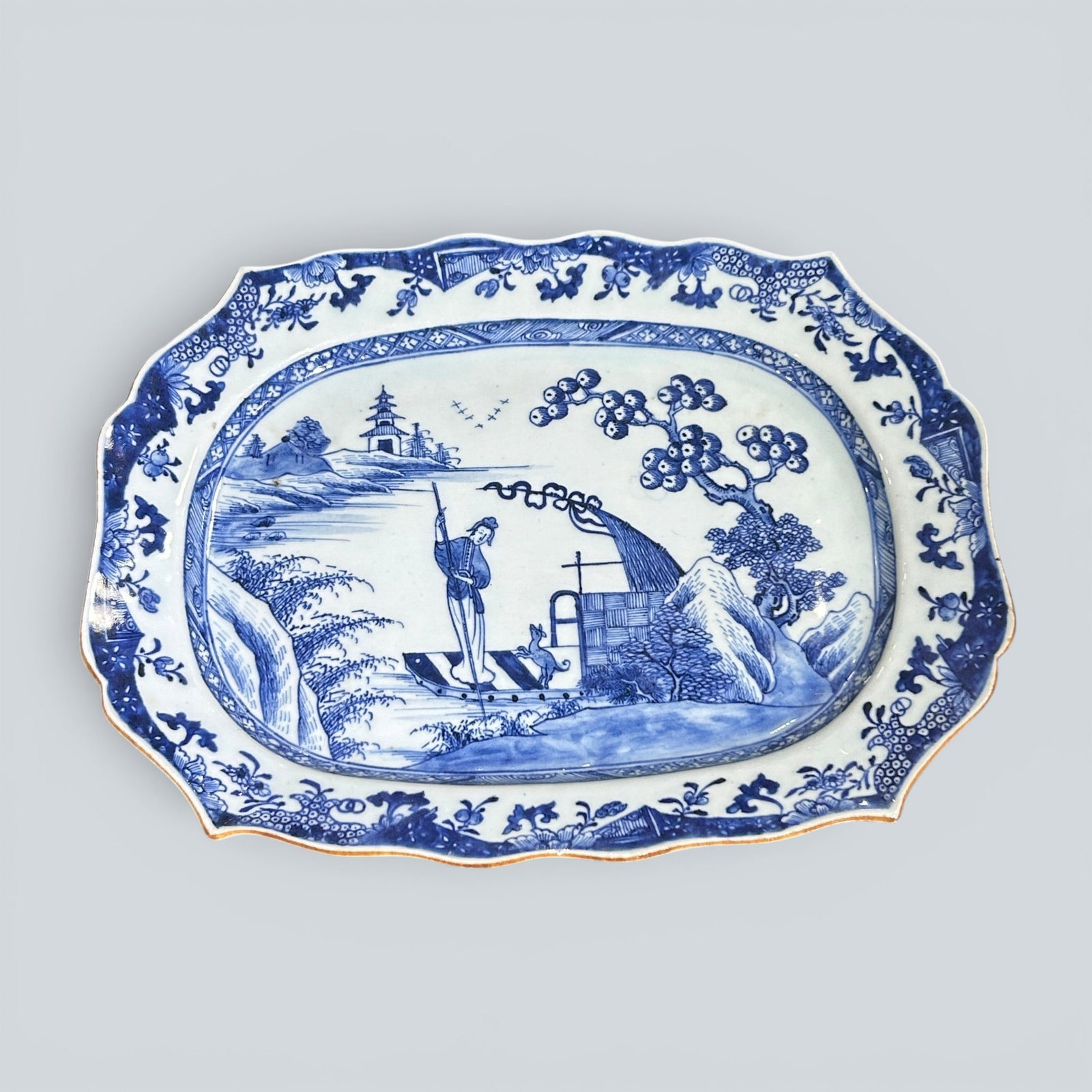 Chinese Art, A Blue and White Dish Decorated with Figures, 18th Century, Qing Dynasty: Chinese Art, A Blue and White Dish Decorated with Figures, 18th Century, Qing Dynasty, Length 36 cm, Width 27 cm.