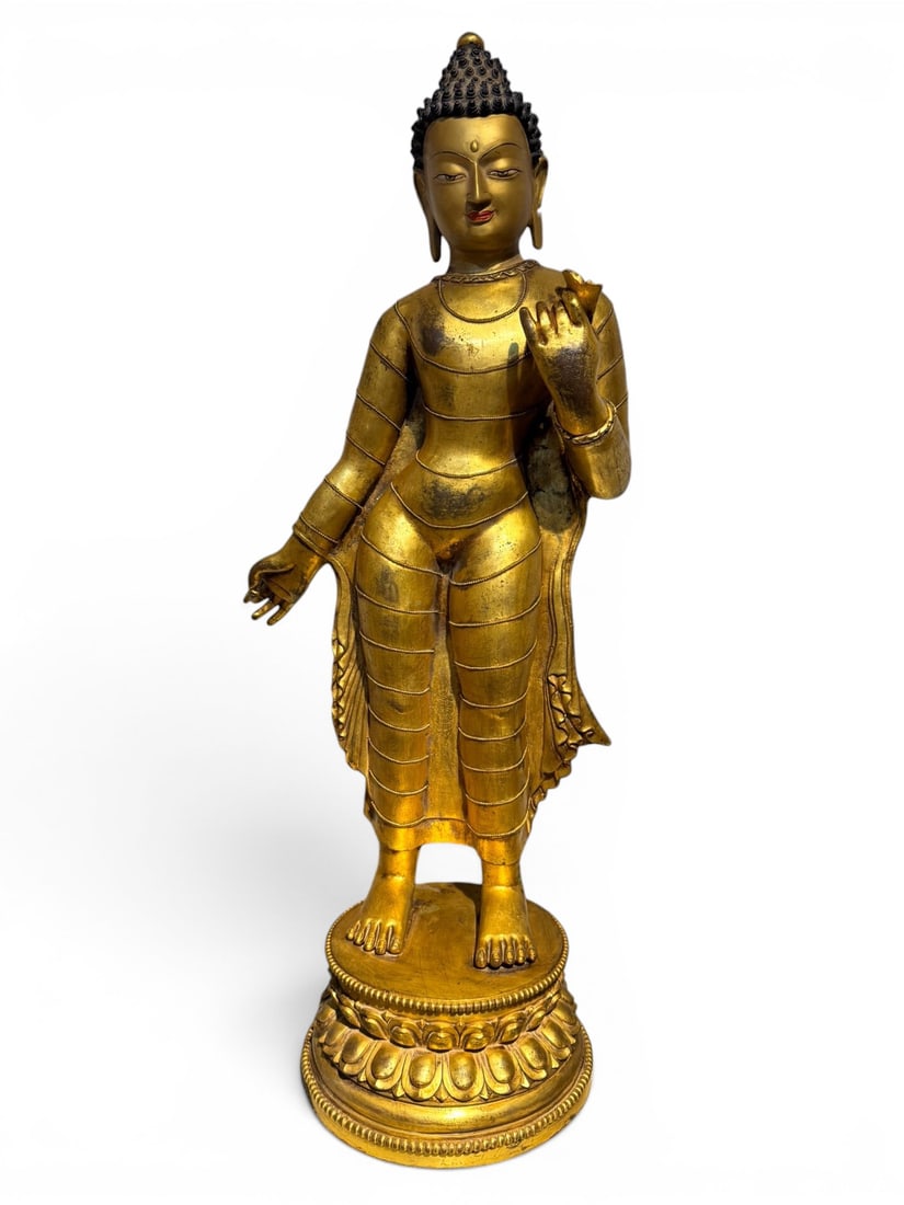 Himalayan Art, Tibet, A Large Gilt-Bronze Figure of Shakyamuni Buddha, 14th-17th Century: Himalayan Art, Tibet, A Large Gilt-Bronze Figure of Shakyamuni Buddha, 14th-17th Century, Height 75 cm .