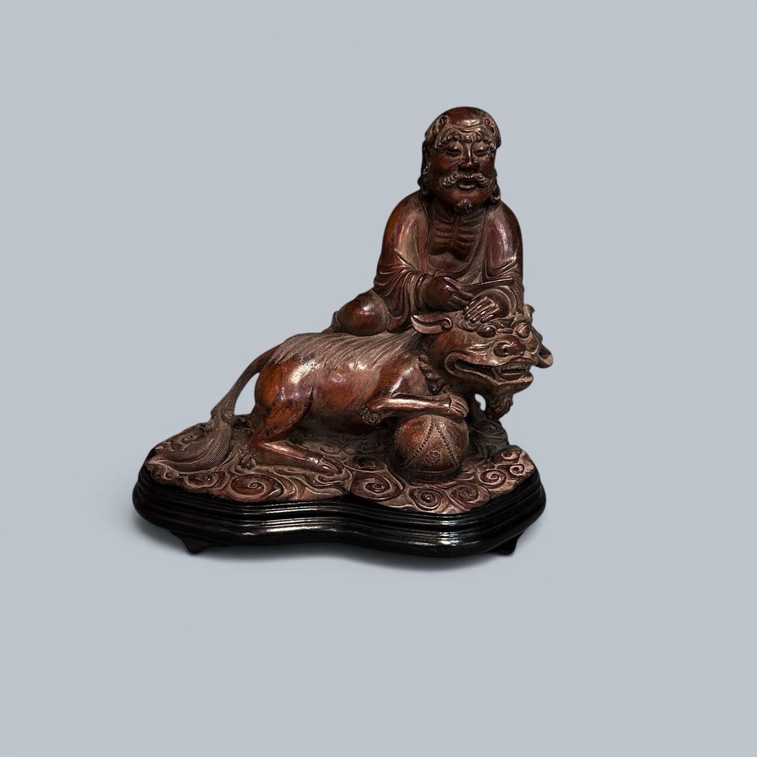 Chinese Art, A Carved Wood Figure, 16th-18th Century, Qing Dynasty: Chinese Art, A Carved Wood Figure, 16th-18th Century, Qing Dynasty, Height 19.7 cm, Length 21.5 cm.