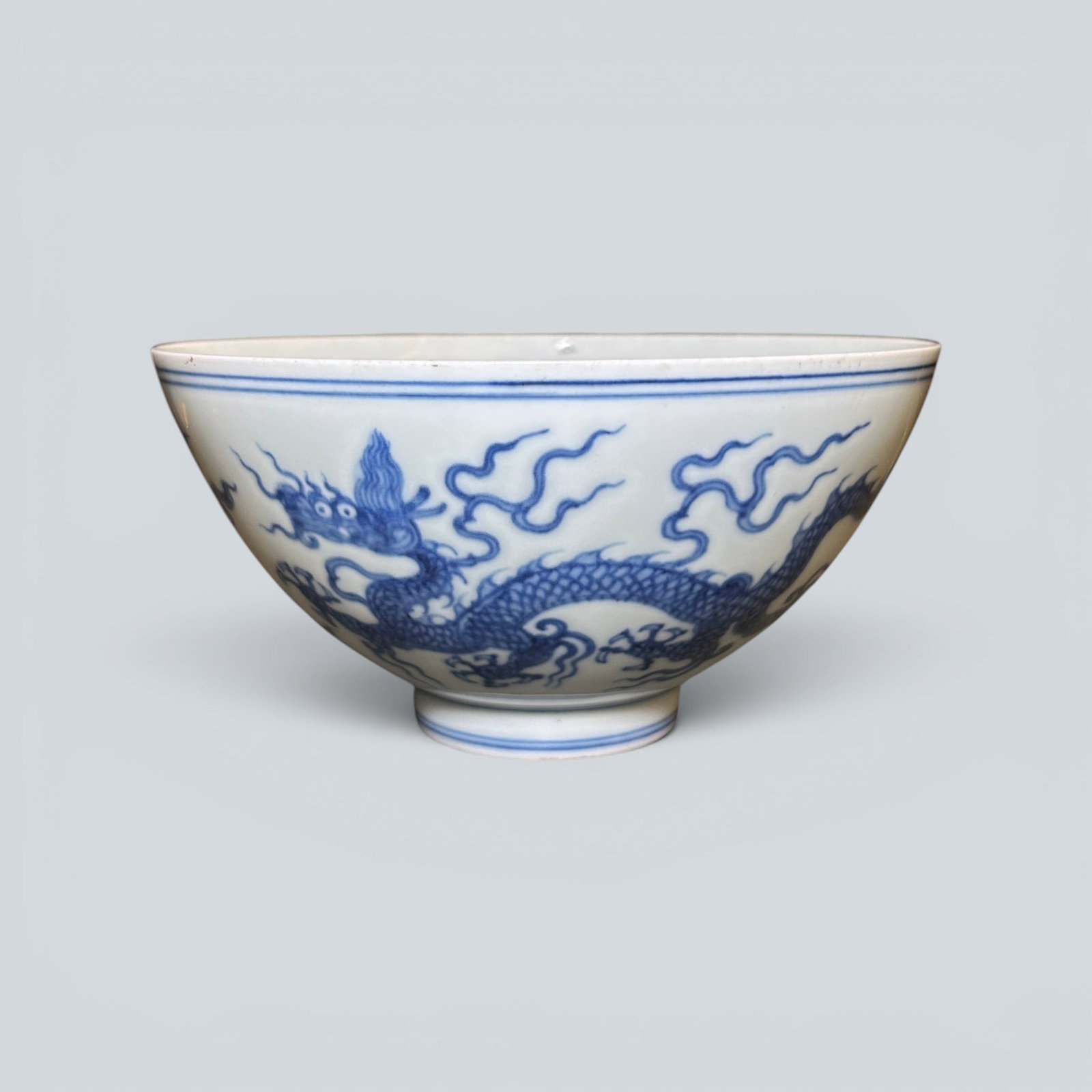 Chinese Art, A Blue and White Bowl Decorated with Dragons, 15th Century, Ming Dynasty: Chinese Art, A Blue and White Bowl Decorated with Dragons, 15th Century, Ming Dynasty, Height 7.5 cm, Diameter 14.8 cm.