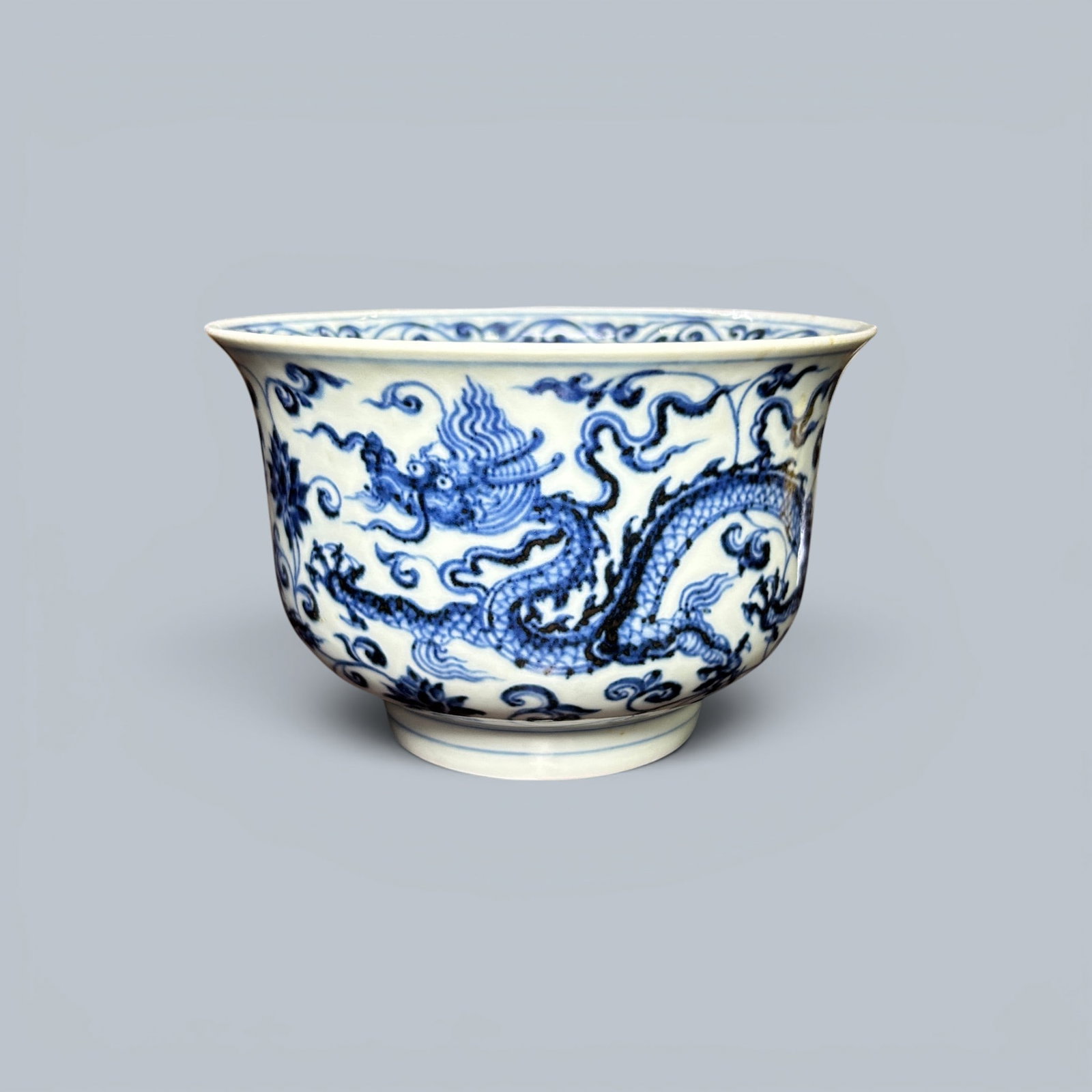 Chinese Art, A Blue and White Bowl Decorated with Dragons, 15th Century, Ming Dynasty: Chinese Art, A Blue and White Bowl Decorated with Dragons, 15th Century, Ming Dynasty, Height 10.2 cm, Diameter 15.2 cm.