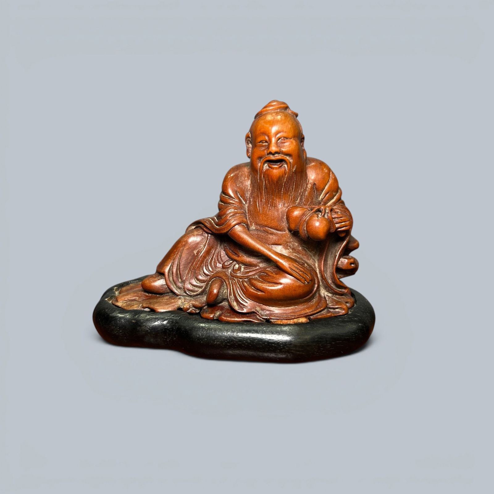 Chinese Art, A Carved Wood Figure, 17th-19th Century, Qing Dynasty: Chinese Art, A Carved Wood Figure, 17th-19th Century, Qing Dynasty, Height 8.2 cm, Width 10.2 cm.