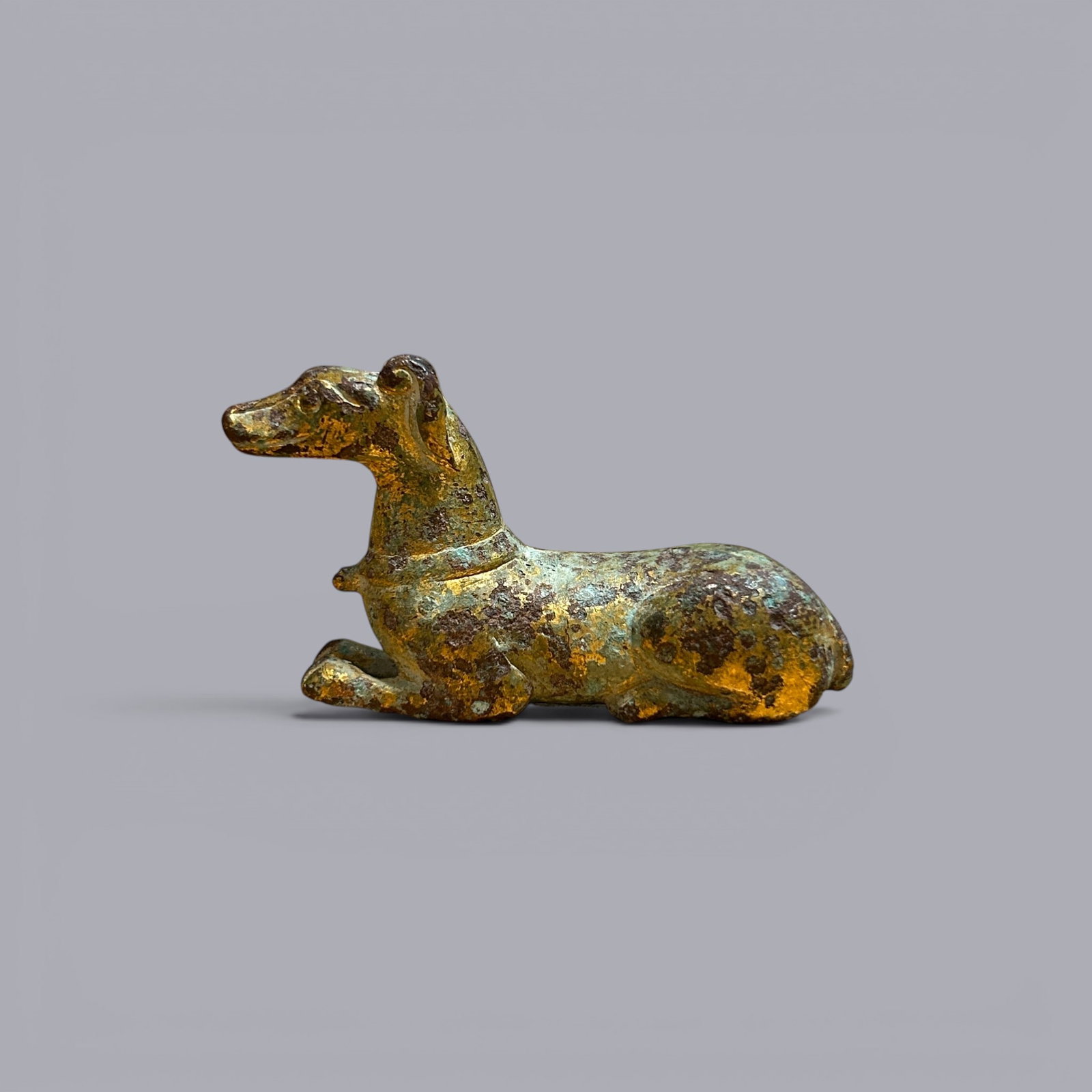 Chinese Art, A Gilt-Bronze Dog Figure, 3rd Century BC-3rd Century AD, Han Dynasty: Chinese Art, A Gilt-Bronze Dog Figure, 3rd Century BC?C3rd Century AD, Han Dynasty, Height 3.8 cm, Length 7.5 cm, Width 1.9 cm Condition Report:good condition, no issues