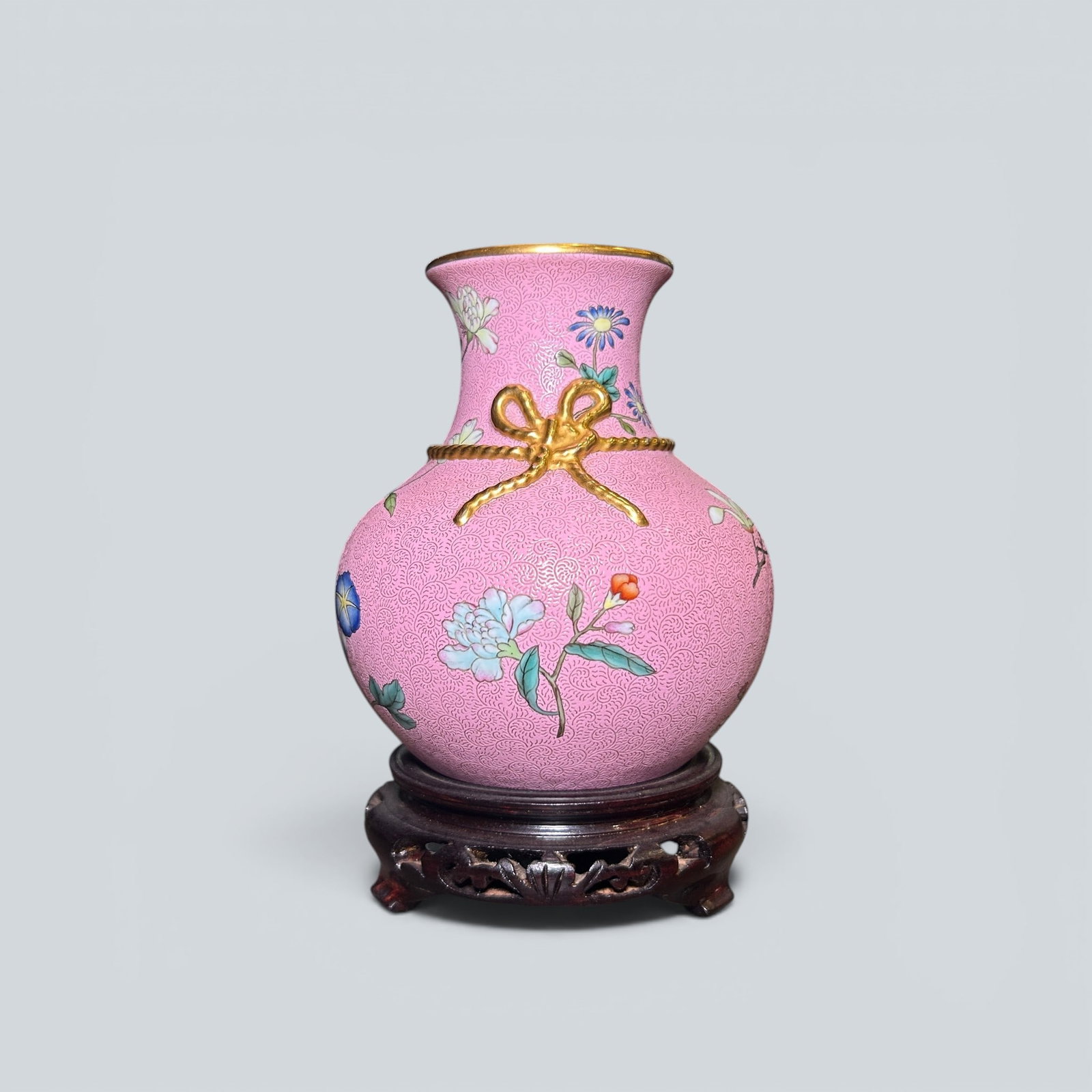 Chinese Art, A Famille Rose Vase Decorated with Floral Motifs, 18th Century, Qing Dynasty: Chinese Art, A Famille Rose Vase Decorated with Floral Motifs, 18th Century, Qing Dynasty, Height 11.8 cm.