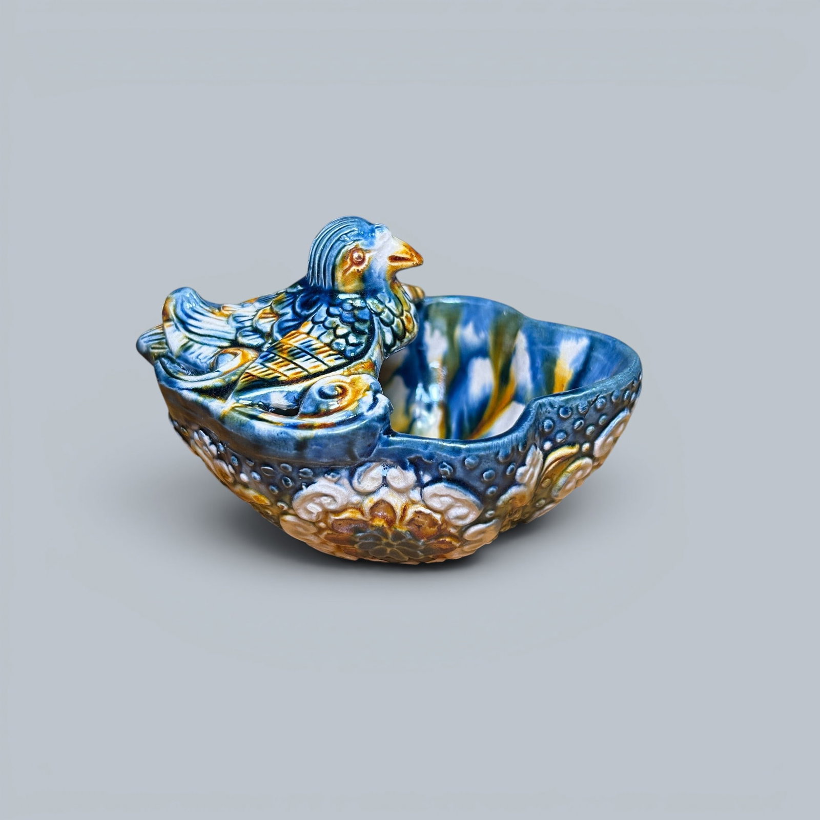 Chinese Art, A Sancai Bird-Shaped Cup, 7th-10th Century, Tang Dynasty: Chinese Art, A Sancai Bird-Shaped Cup, 7th-10th Century, Tang Dynasty, Height 12 cm, Width 8 cm, Length 9.3 cm.