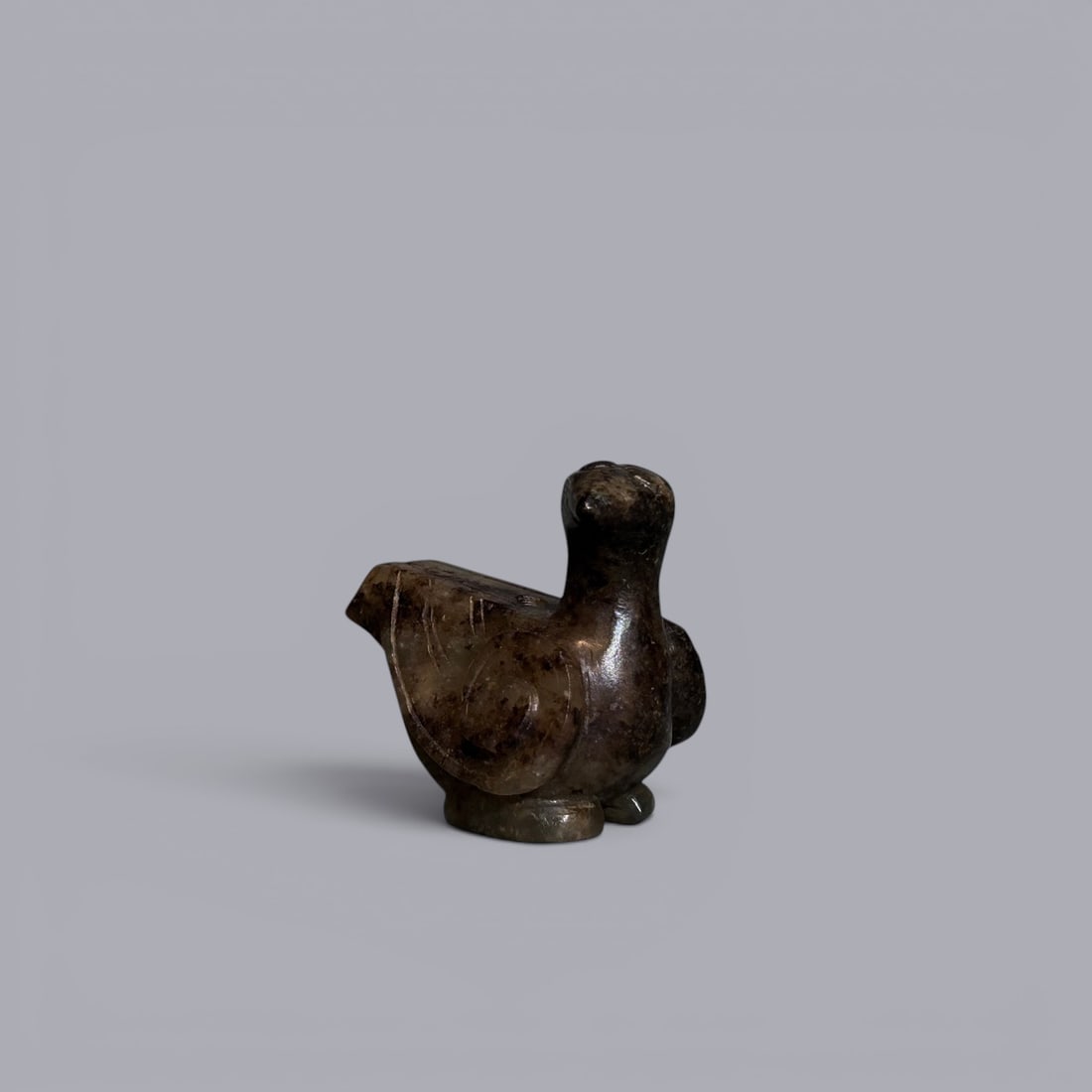 Chinese Art, A Jade Fish and Bird, 3rd Century BC-3rd Century AD, Han Dynasty: Chinese Art, A Jade Fish and Bird, 3rd Century BC-3rd Century AD, Han Dynasty, Length 3.5 cm, Height 3.3 cm.