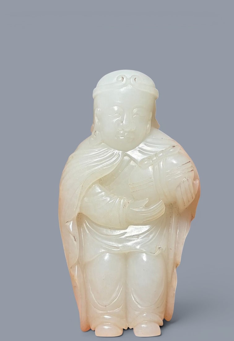 Chinese Art, A White Jade Figure of a Man, 16th-18th Century, Qing Dynasty: Chinese Art, A White Jade Figure of a Man, 16th-18th Century, Qing Dynasty, Height 8 cm, Length 4.4 cm, Width 2.1 cm.