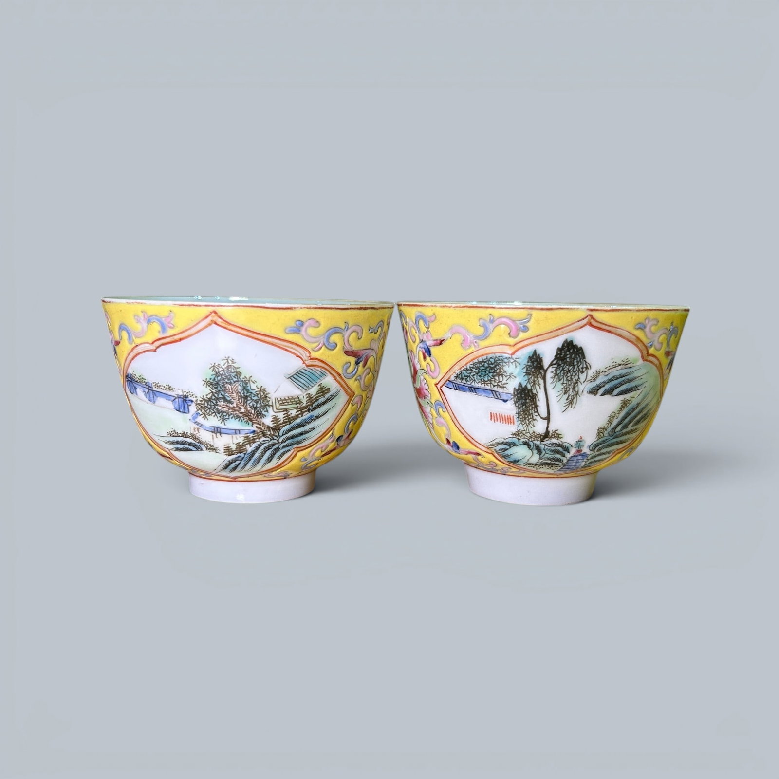 Chinese Art, A Pair of Famille Rose Cups Decorated with Landscapes, 19th Century, Qing Dynasty: Chinese Art, A Pair of Famille Rose Cups Decorated with Landscapes, 19th Century, Qing Dynasty, Height 5.5 cm, Diameter 8.5 cm.