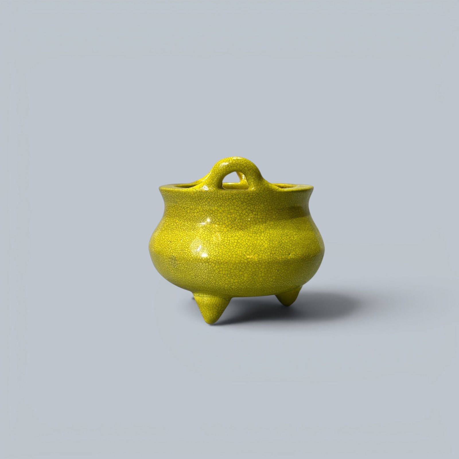 Chinese Art, A Yellow-Glazed Incense Burner, 19th Century, Qing Dynasty: Chinese Art, A Yellow-Glazed Incense Burner, 19th Century, Qing Dynasty, Height 10.6 cm.