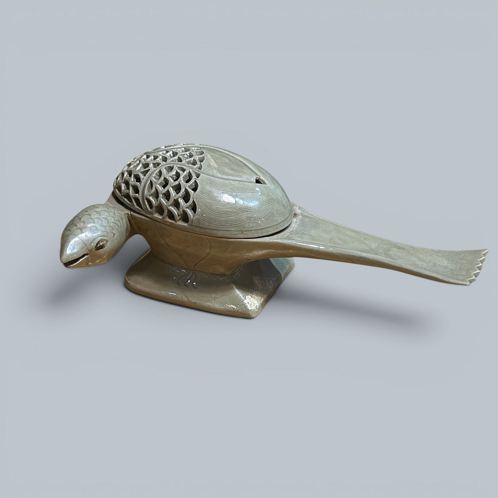Chinese Art, A Celadon Bird-Shaped Incense Burner, 10th-13th Century, Song Dynasty: Chinese Art, A Celadon Bird-Shaped Incense Burner, 10th-13th Century, Song Dynasty, Length 23.5 cm, Height 8 cm, Width 14 cm.