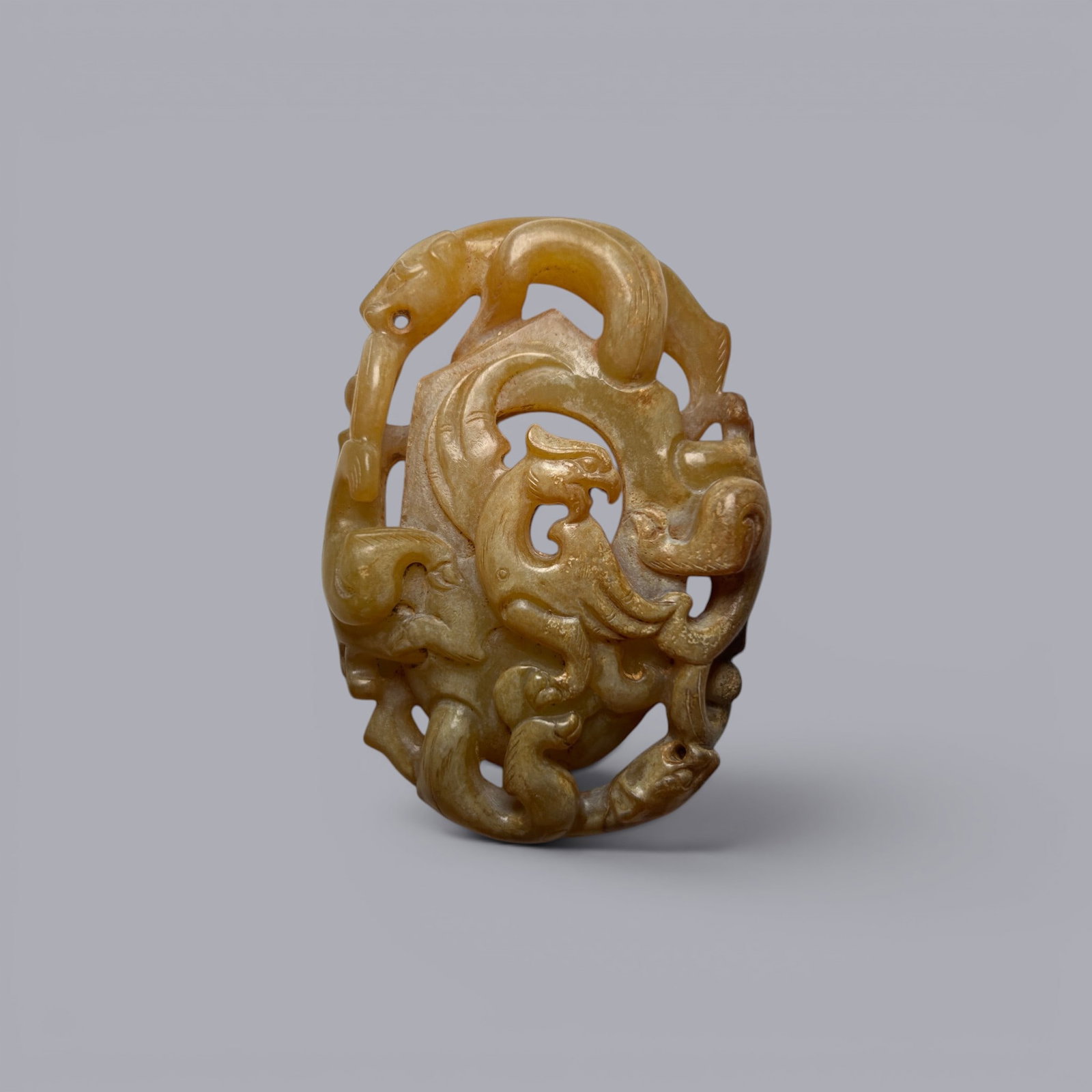 Chinese Art, A Jade Dragon-Shaped Thumb Ring Pendant, 3rd Century BC-3rd Century AD, Han Dynasty: Chinese Art, A Jade Dragon-Shaped Thumb Ring Pendant, 3rd Century BC?C3rd Century AD, Han Dynasty, Length 6.8 cm, Width 4.8 cm.