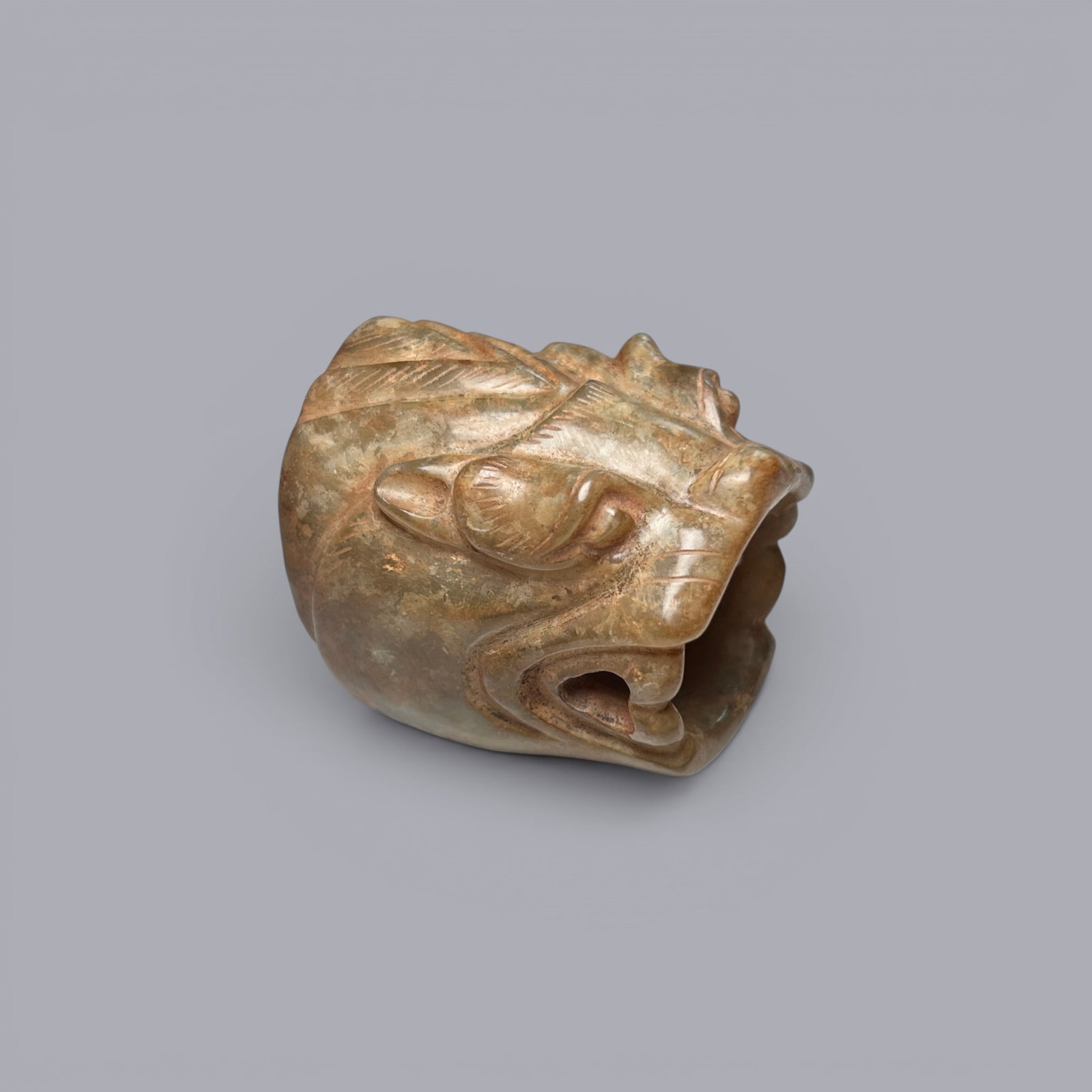 Chinese Art, A Jade Ornament with Beast Head, 3rd Century BC-3rd Century AD, Han Dynasty: Chinese Art, A Jade Ornament with Beast Head, 3rd Century BC-3rd Century AD, Han Dynasty, Height 3.7 cm, Length 4.3 cm, Width 3.3 cm.