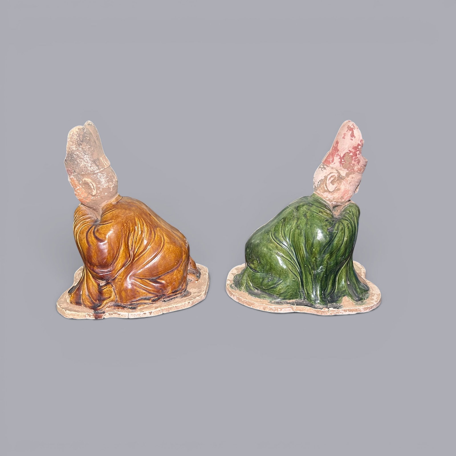 Chinese Art, A Pair of Sancai Figures, 7th-10th Century, Tang Dynasty: Chinese Art, A Pair of Sancai Figures, 7th-10th Century, Tang Dynasty, Heights 28 cm and 27.8 cm.