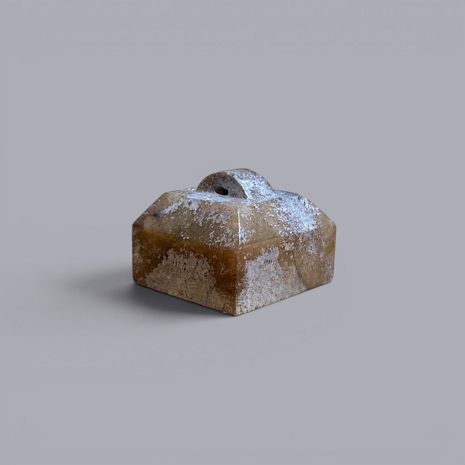 Chinese Art, A Jade Seal, 3rd Century BC-3rd Century AD, Han Dynasty: Chinese Art, A Jade Seal, 3rd Century BC-3rd Century AD, Han Dynasty, Height 2.4 cm, Width 2.9 cm.