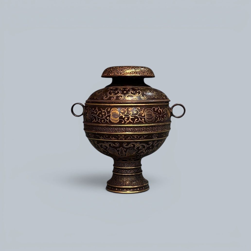 Chinese Art, A Brown-Glazed Dou Vessel Decorated with Gilt Melons and Fruits, 18th Century, Qing: Chinese Art, A Brown-Glazed Dou Vessel Decorated with Gilt Melons and Fruits, 18th Century, Qing Dynasty, Height 12 cm.