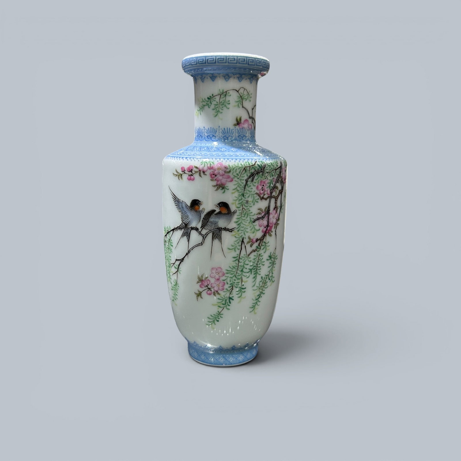 Chinese Art, A Famille Rose Vase Decorated with Flowers and Swallows, 20th Century, Republic Period: Chinese Art, A Famille Rose Vase Decorated with Flowers and Swallows, 20th Century, Republic Period, Height 11.8 cm.