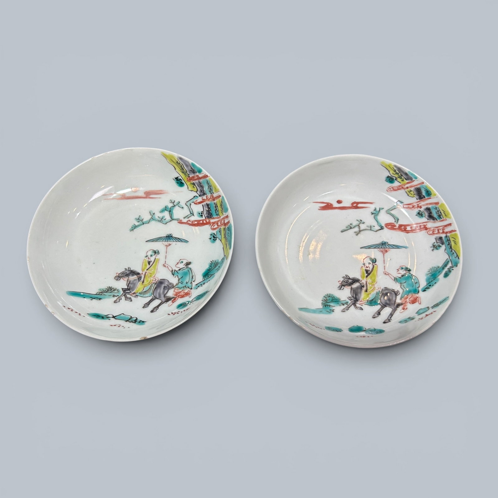 Chinese Art, A Pair of Wucai Dishes Decorated with Figures, 16th Century, Ming Dynasty: Chinese Art, A Pair of Wucai Dishes Decorated with Figures, 16th Century, Ming Dynasty, Diameter 10.1 cm.