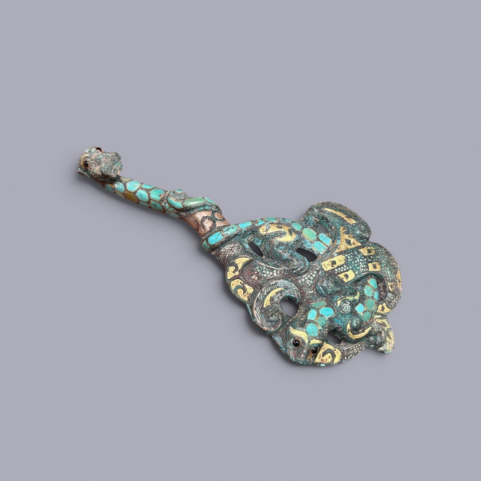 Chinese Art, A Bronze Belt Hook, Zhou Dynasty, 8th-3rd Century BC: Chinese Art, A Bronze Belt Hook, Zhou Dynasty, 8th-3rd Century BC, Length 17.1 cm, Width 8.1 cm.