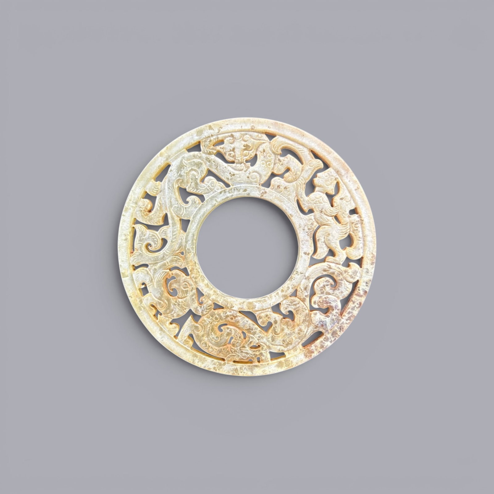 Chinese Art, A Jade Ring Decorated with Dragons, 3rd Century BC-3rd Century AD, Han Dynasty: Chinese Art, A Jade Ring Decorated with Dragons, 3rd Century BC-3rd Century AD, Han Dynasty, Diameter 8.5 cm.