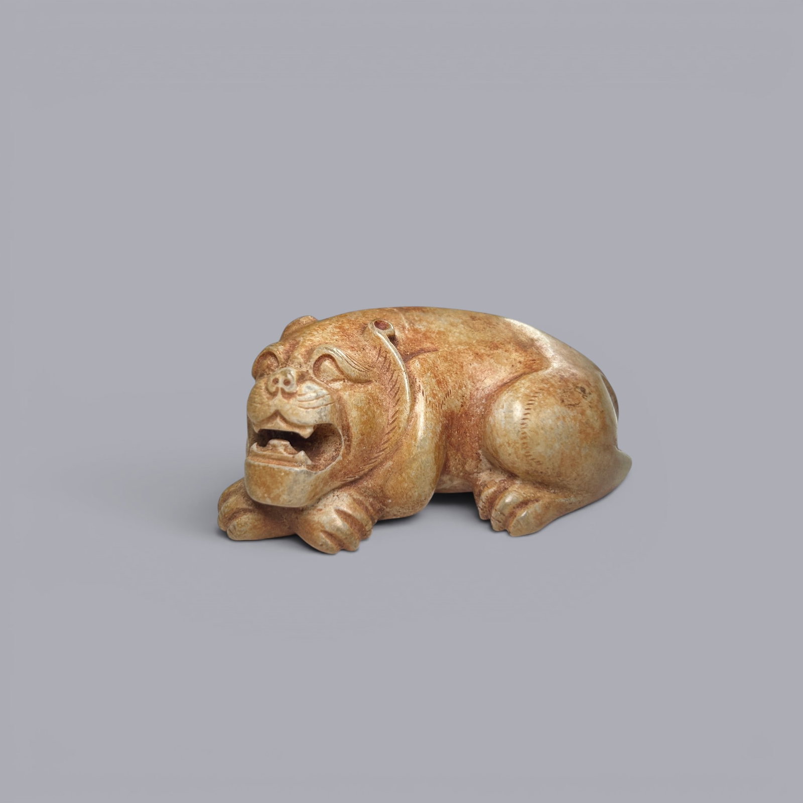 Chinese Art, A Jade Beast, 3rd Century BC-3rd Century AD, Han Dynasty: Chinese Art, A Jade Beast, 3rd Century BC-3rd Century AD, Han Dynasty, Length 6.9 cm, Height 4.2 cm, Width 2.8 cm.