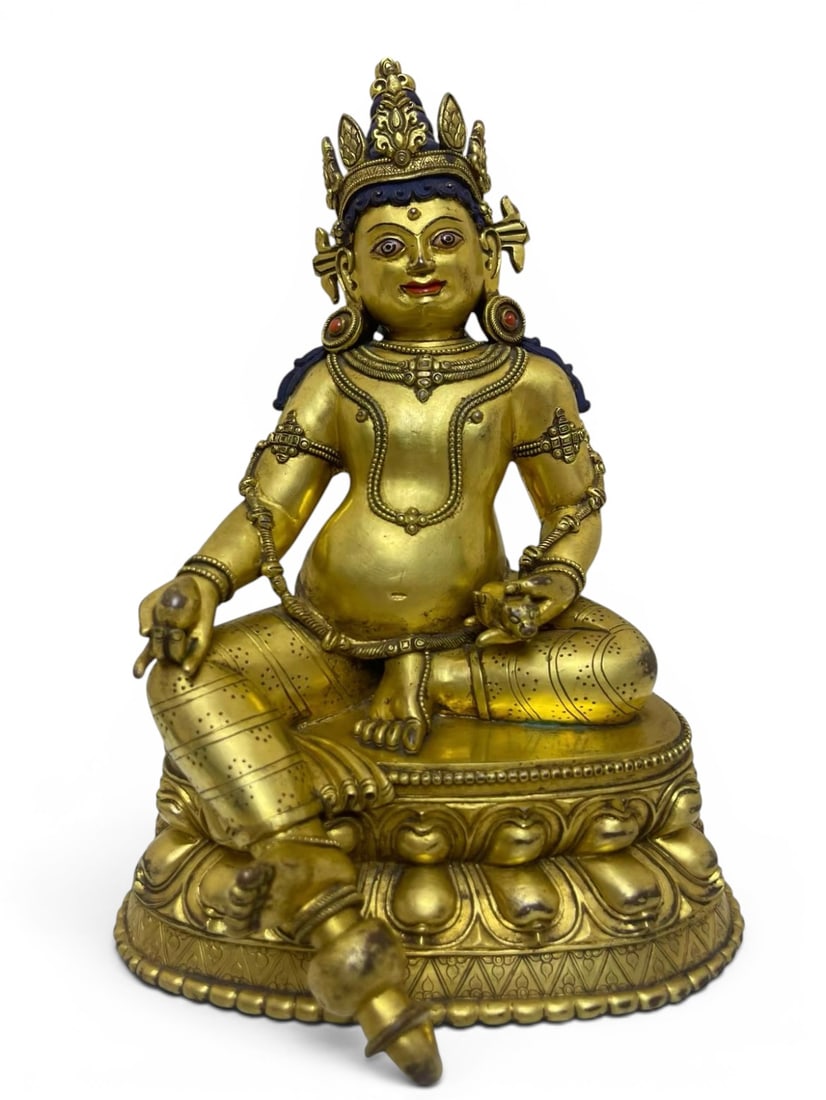 Himalayan Art, Tibet, A Gilt-Bronze Figure of Yellow Jambhala, 16th-18th Century: Himalayan Art, Tibet, A Gilt-Bronze Figure of Yellow Jambhala, 16th-18th Century, Height 29 cm.