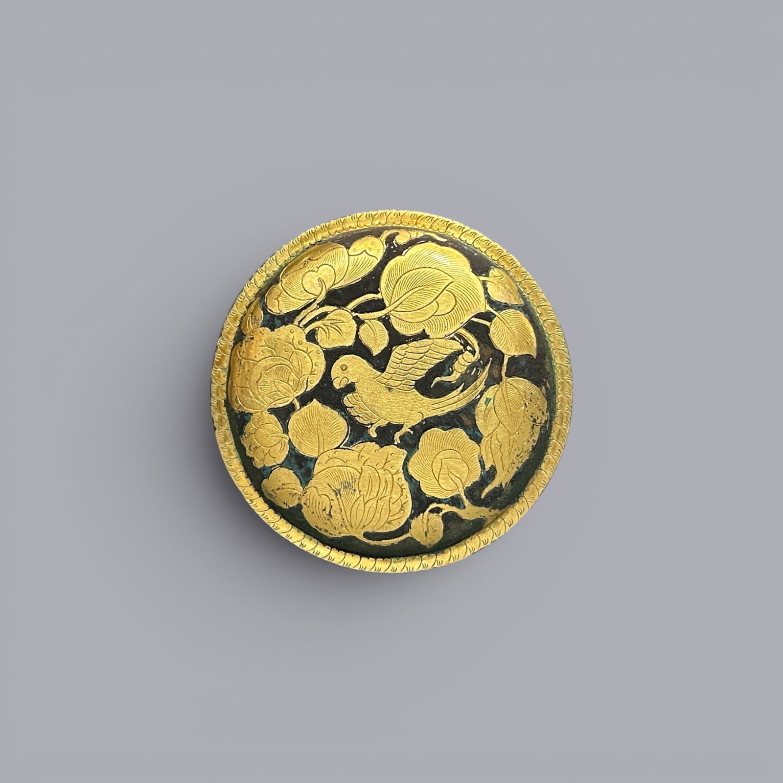 Chinese Art, A Gilt-Silver Covered Box Decorated with Bird Motifs, 7th-10th Century, Tang Dynasty: Chinese Art, A Gilt-Silver Covered Box Decorated with Bird Motifs, 7th-10th Century, Tang Dynasty, Diameter 9 cm, Height 3.5 cm.
