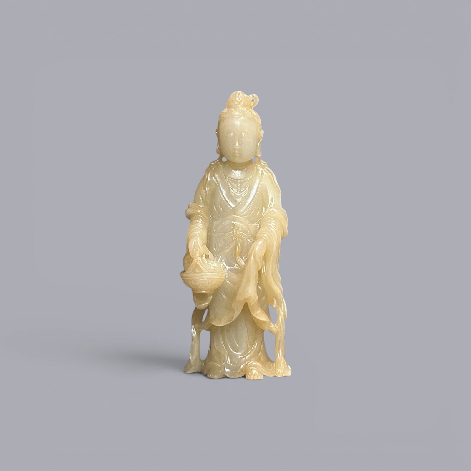 Chinese Art, A White Jade Figure of Buddha, 18th Century, Qing Dynasty: Chinese Art, A White Jade Figure of Buddha, 18th Century, Qing Dynasty, Height 12.2 cm.