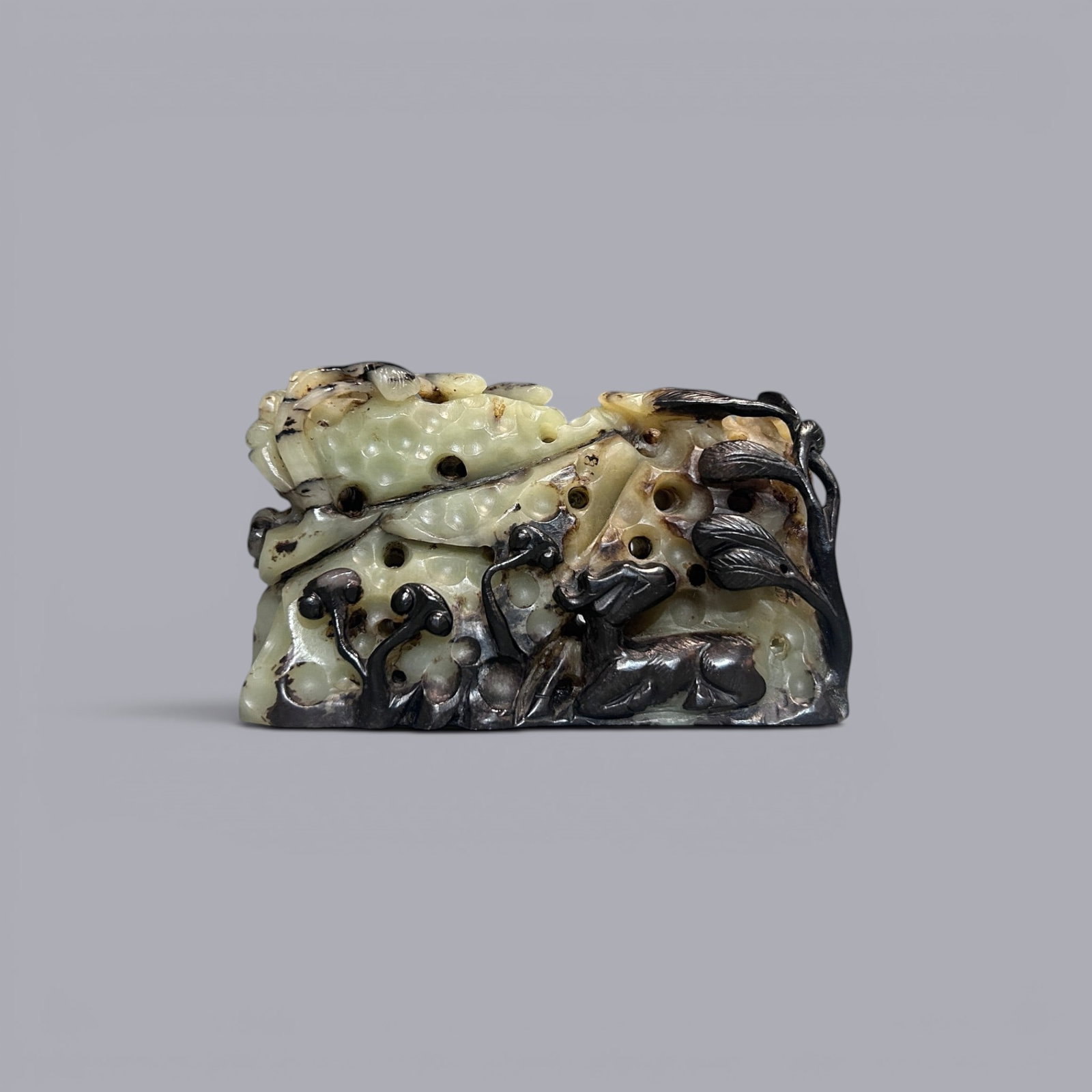 Chinese Art, A Jade Carving Decorated with Deer and Lingzhi, 13th-14th Century, Yuan Dynasty: Chinese Art, A Jade Carving Decorated with Deer and Lingzhi, 13th-14th Century, Yuan Dynasty, Height 7.3 cm, Length 13.9 cm.